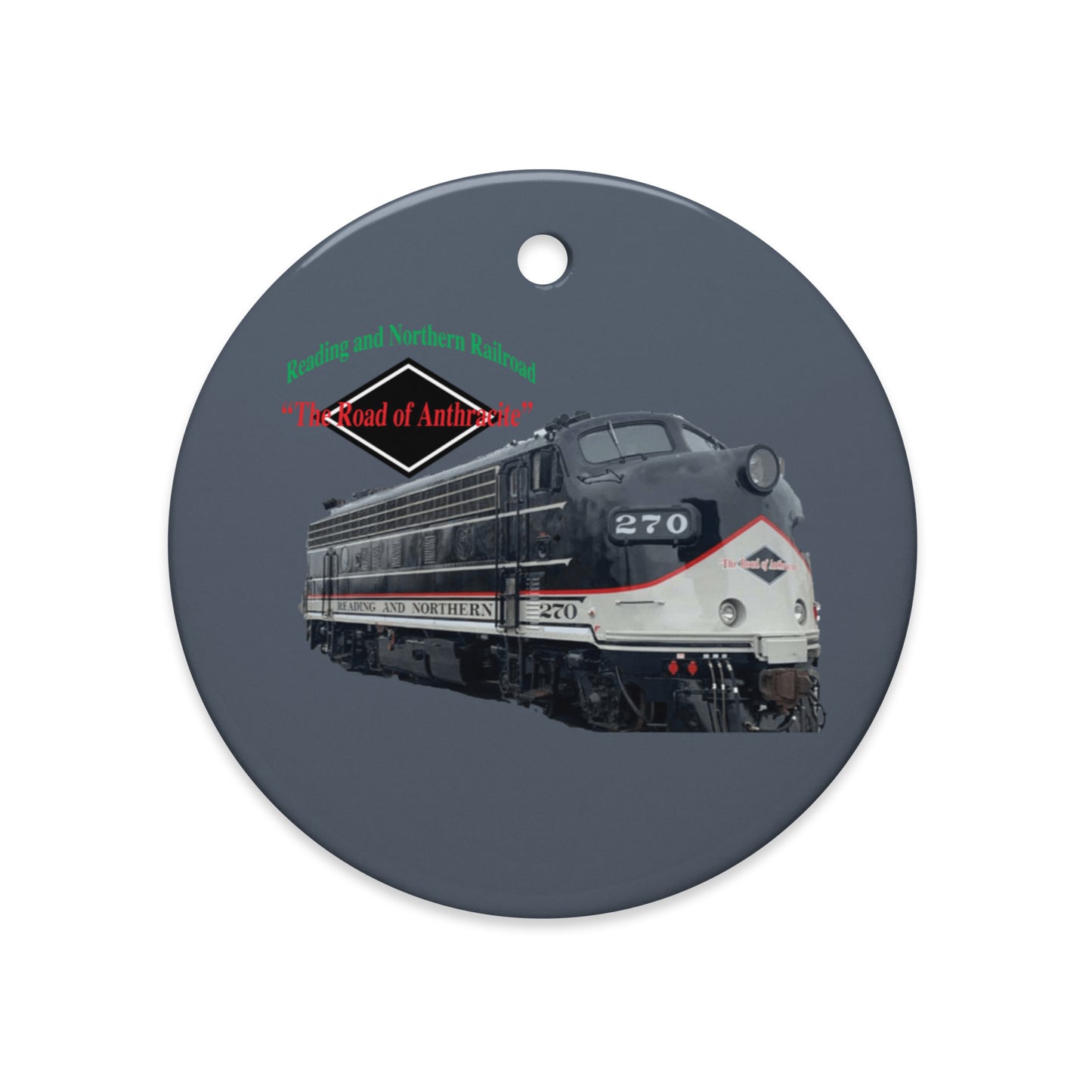 Ceramic Ornament with a train design and text on a gray background