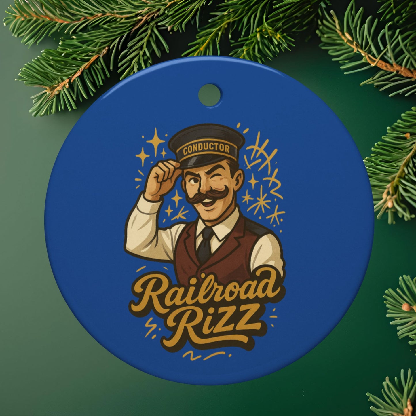 Circular blue ornament with a conductor illustration and 'Railroad Rizz' text, surrounded by green pine branches.