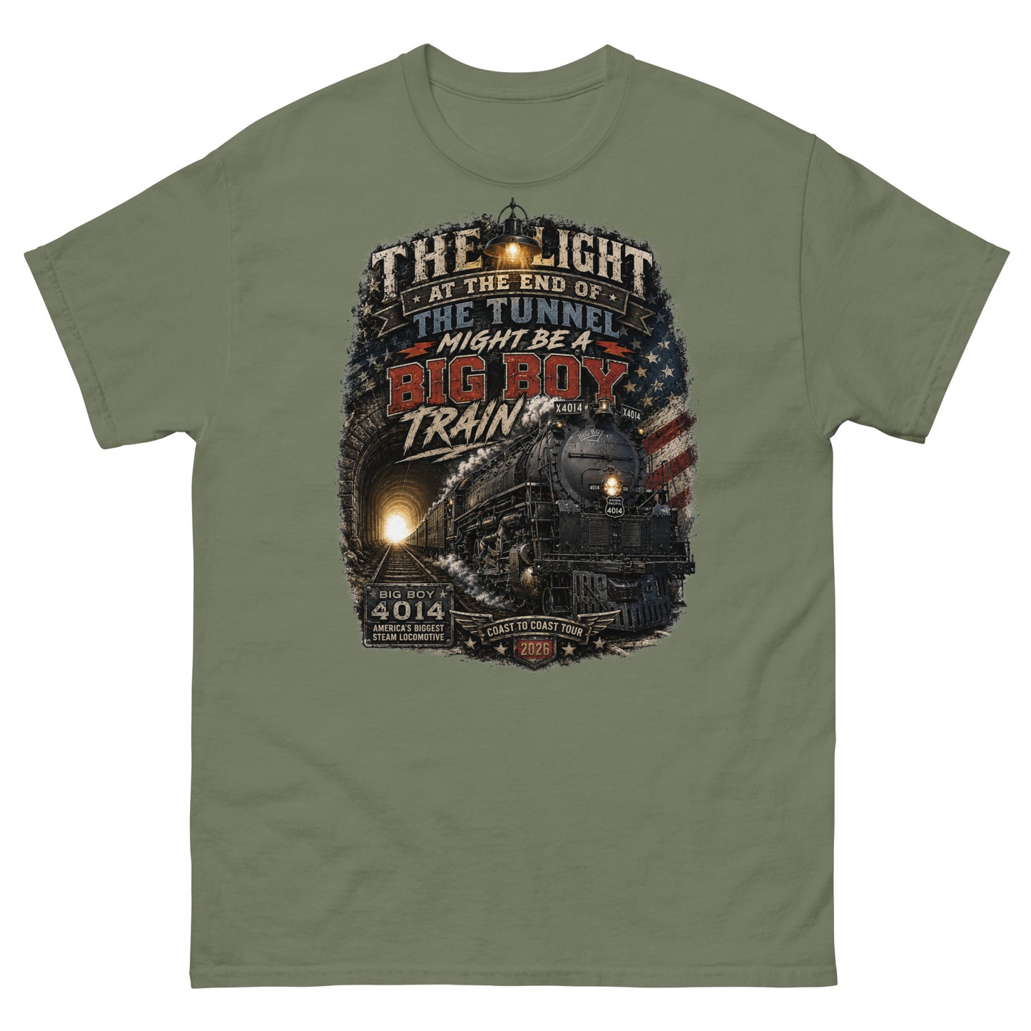 Army green t-shirt featuring a highly detailed vintage graphic. The design shows the Big Boy 4014 steam locomotive emerging from a dark tunnel with a glowing light behind it. A vintage lantern hangs at the top, and a distressed American flag is on the right. Bold text reads "THE LIGHT AT THE END OF THE TUNNEL MIGHT BE A BIG BOY TRAIN". Bottom badges read "BIG BOY 4014 AMERICA'S BIGGEST STEAM LOCOMOTIVE" and "COAST TO COAST TOUR 2026".