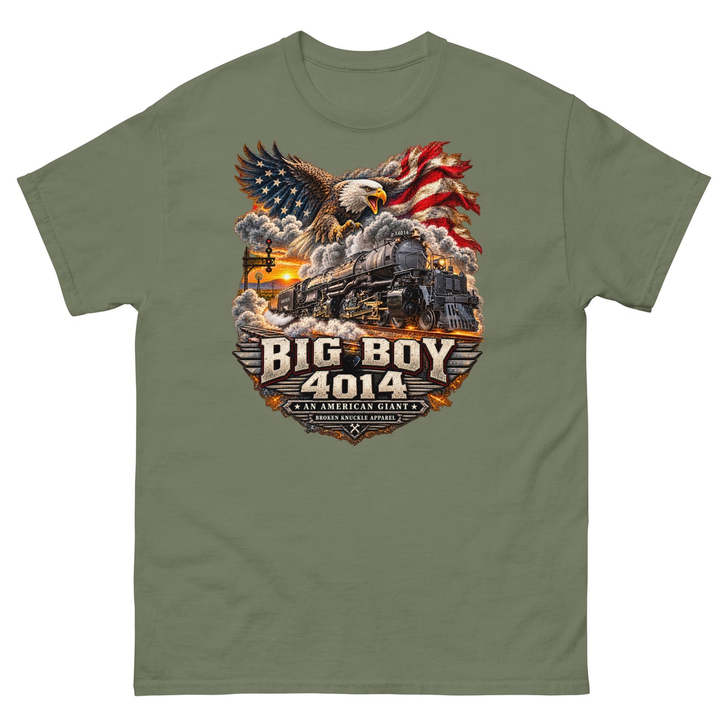 Army green classic t-shirt featuring a highly detailed patriotic graphic. A bald eagle and American flag soar above the Big Boy 4014 steam locomotive charging down the tracks at sunset. Bold metallic-style text reads "BIG BOY 4014" above a banner reading "AN AMERICAN GIANT" and the Broken Knuckle Apparel logo.