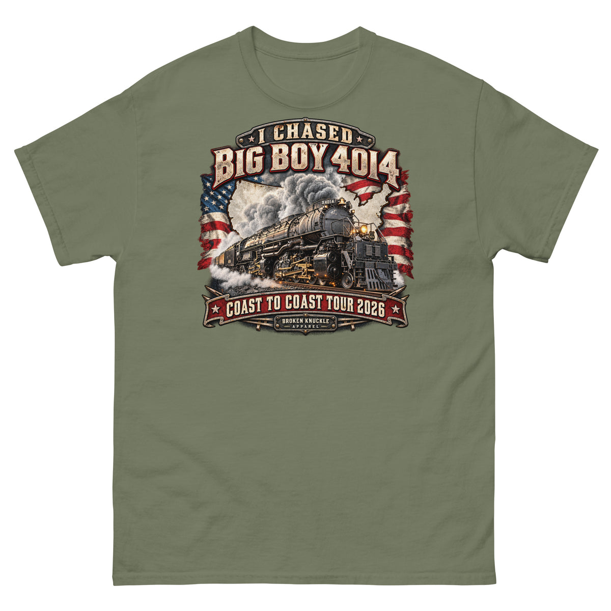 Army green classic t-shirt featuring a graphic of the Big Boy 4014 steam locomotive charging forward under a plume of smoke. The background features a distressed white USA map and waving American flags. Vintage text reads "I CHASED BIG BOY 4014" at the top and "COAST TO COAST TOUR 2026" on a red banner at the bottom above the Broken Knuckle Apparel logo.