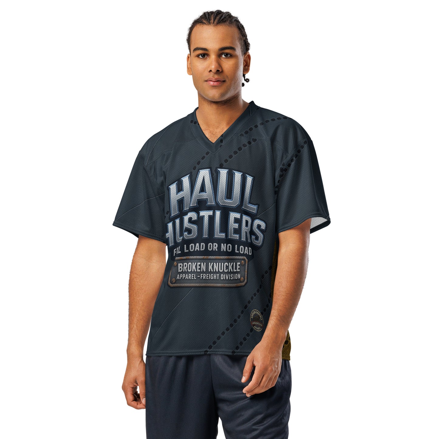 Man wearing a dark gray 'Haul Hustlers' jersey on a white background