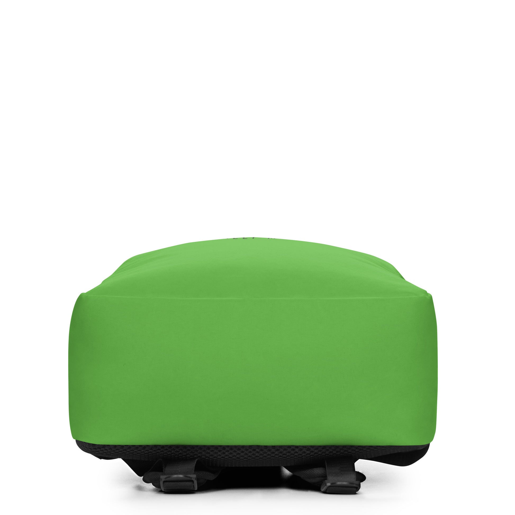 A vibrant green minimalist backpack displayed at a slight angle on a white background, featuring a bold graphic with the word HIGHBALL in tall black letters, where the letter I is a green railroad signal, sitting above the text KEEP MOVING.