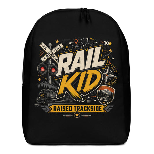 Black minimalist backpack featuring a colorful graphic design. The main text reads "RAIL KID" in large, bold letters, with a yellow banner underneath reading "RAISED TRACKSIDE". The design includes a railroad crossing signal with glowing red lights, a compass, a diesel locomotive train, and a mountain track badge on a dark background.