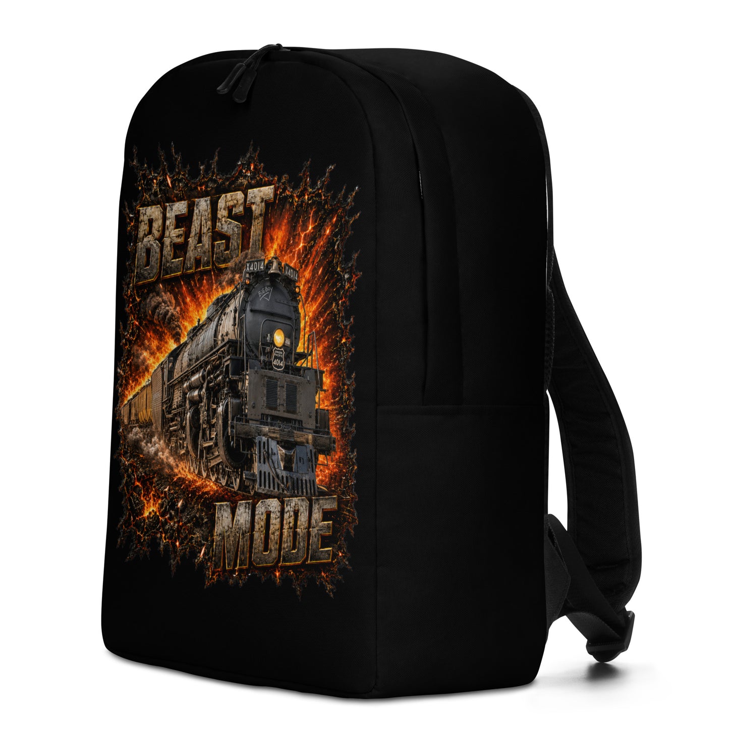 A black minimalist backpack displayed at an angle on a plain white background, featuring an explosive, fiery graphic of a steam locomotive charging forward, framed by the text BEAST at the top and MODE at the bottom in rugged, stone-textured letters.