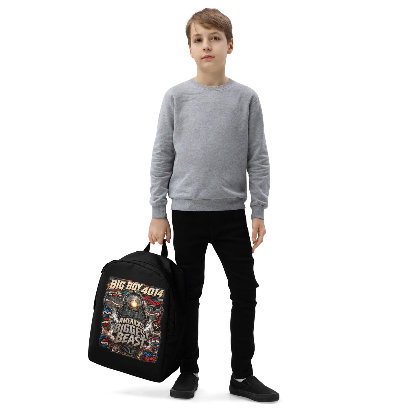 Black minimalist backpack featuring a high-energy, colorful graphic of the Big Boy 4014 steam locomotive backed by a US map, with bold text reading "BIG BOY 4014", "COAST TO COAST TOUR 2026", "AMERICA'S BIGGEST BEAST", "FULL STEAM", "NO BRAKES", "MAX POWER", and "FULL SEND".