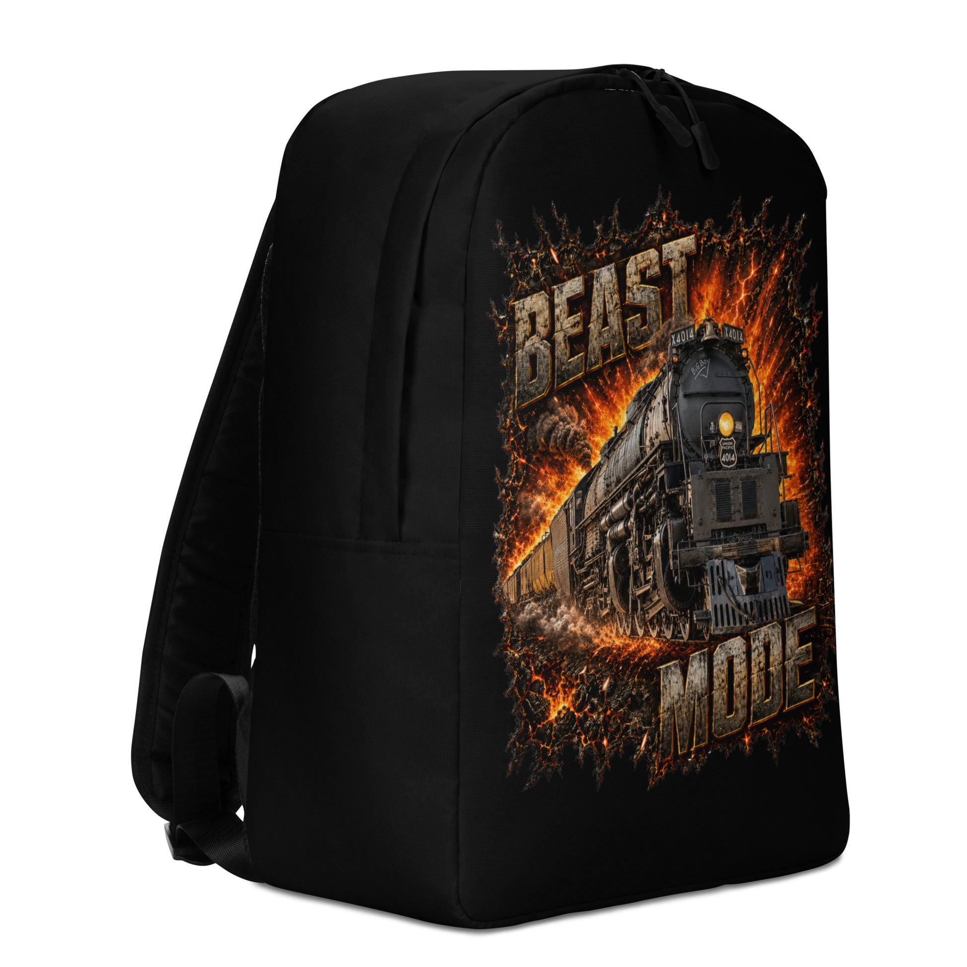 A black minimalist backpack displayed at an angle on a plain white background, featuring an explosive, fiery graphic of a steam locomotive charging forward, framed by the text BEAST at the top and MODE at the bottom in rugged, stone-textured letters.