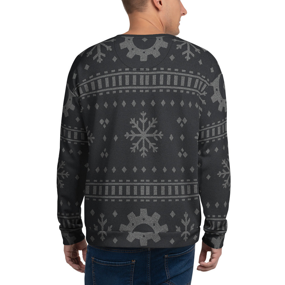 Person wearing a dark gray sweater with a pattern on a white background