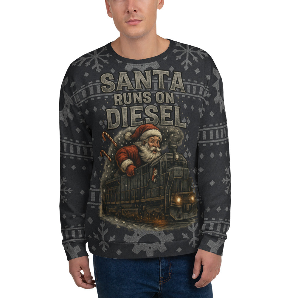 Person wearing a sweater with Santa Claus and train design, text 'Santa Runs on Diesel'.