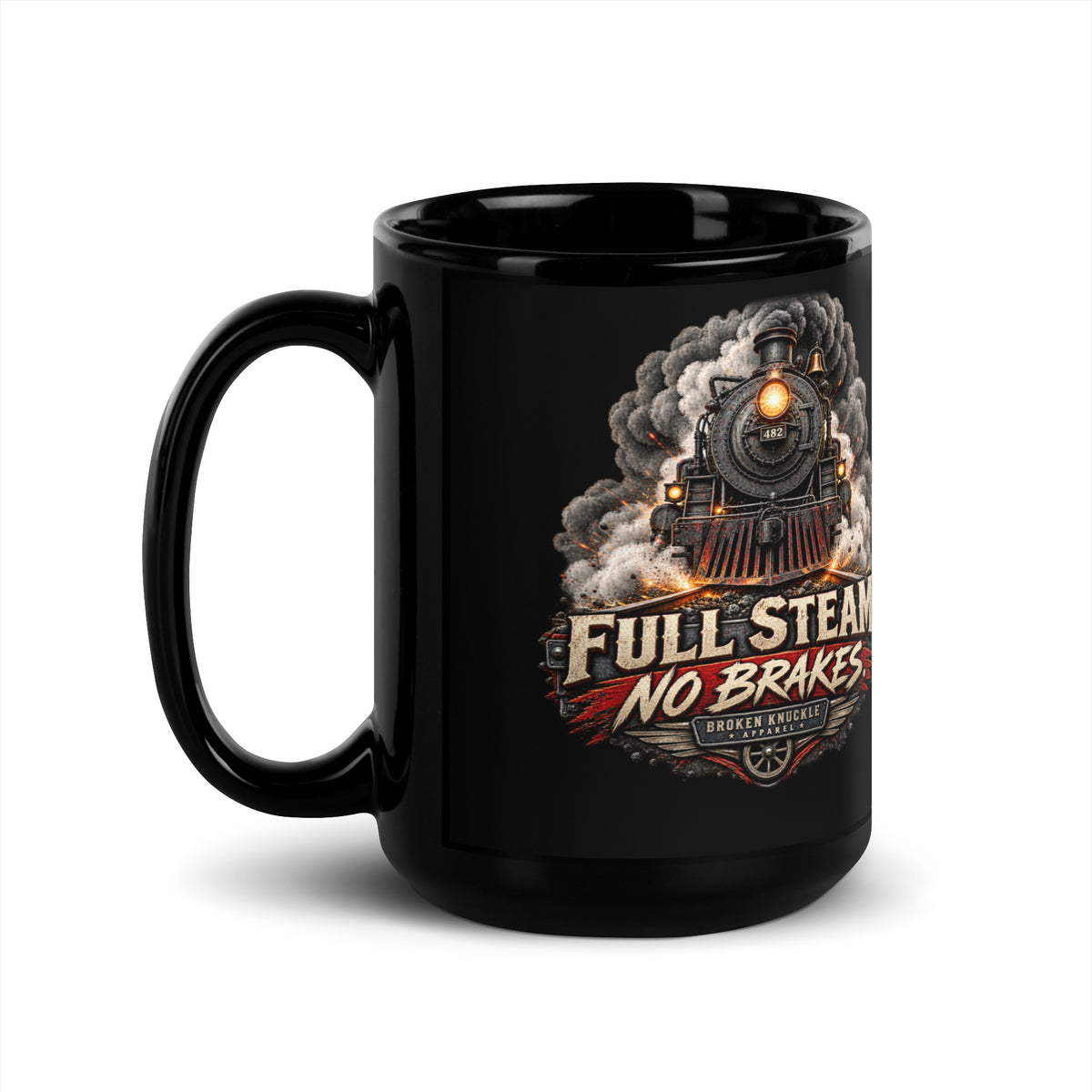 Black glossy 15 oz ceramic mug featuring an explosive graphic of a front-facing steam locomotive bursting through smoke and fiery sparks. Bold, distressed vintage text reads "FULL STEAM. NO BRAKES." above a winged train wheel badge that reads "BROKEN KNUCKLE APPAREL".