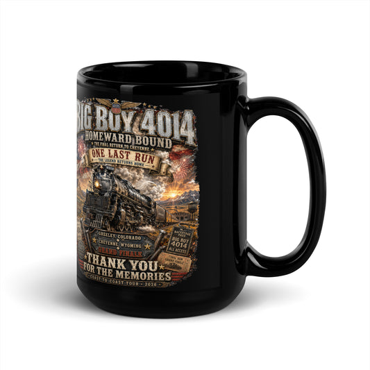 Black 15-ounce glossy coffee mug featuring an intricate graphic of the Big Boy 4014 steam locomotive charging through a western landscape with a sunset and fireworks in the sky. Text reads "BIG BOY 4014", "HOMEWARD BOUND", "ONE LAST RUN", and "THANK YOU FOR THE MEMORIES". The design includes vintage ticket stubs and lists Greeley, Colorado and Cheyenne, Wyoming for the Grand Finale of the Coast to Coast Tour 2026.