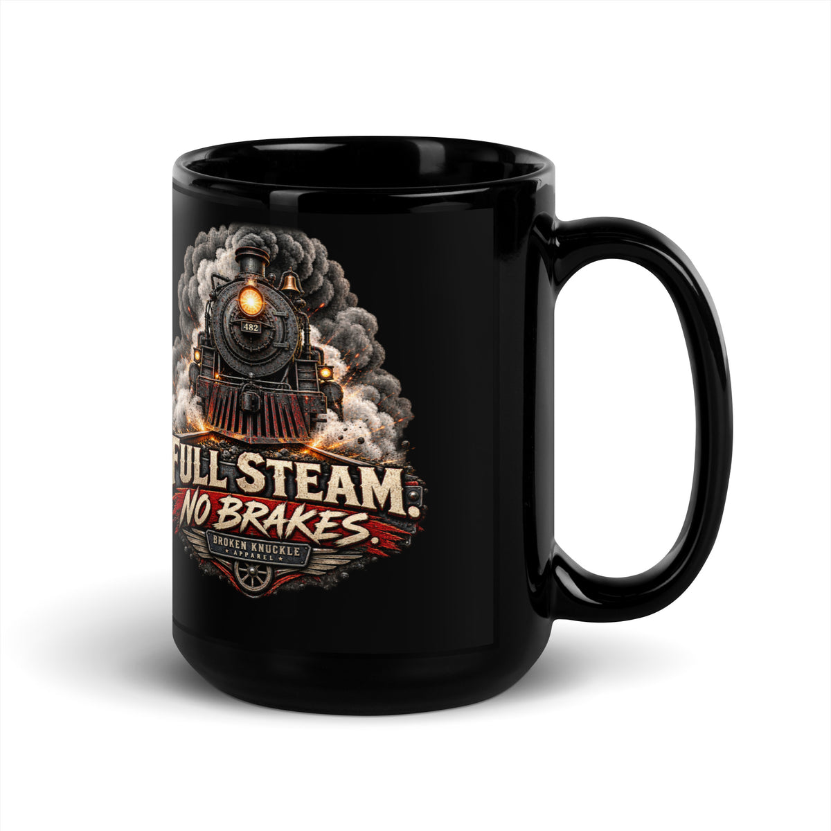 Black glossy 15 oz ceramic mug featuring an explosive graphic of a front-facing steam locomotive bursting through smoke and fiery sparks. Bold, distressed vintage text reads "FULL STEAM. NO BRAKES." above a winged train wheel badge that reads "BROKEN KNUCKLE APPAREL".