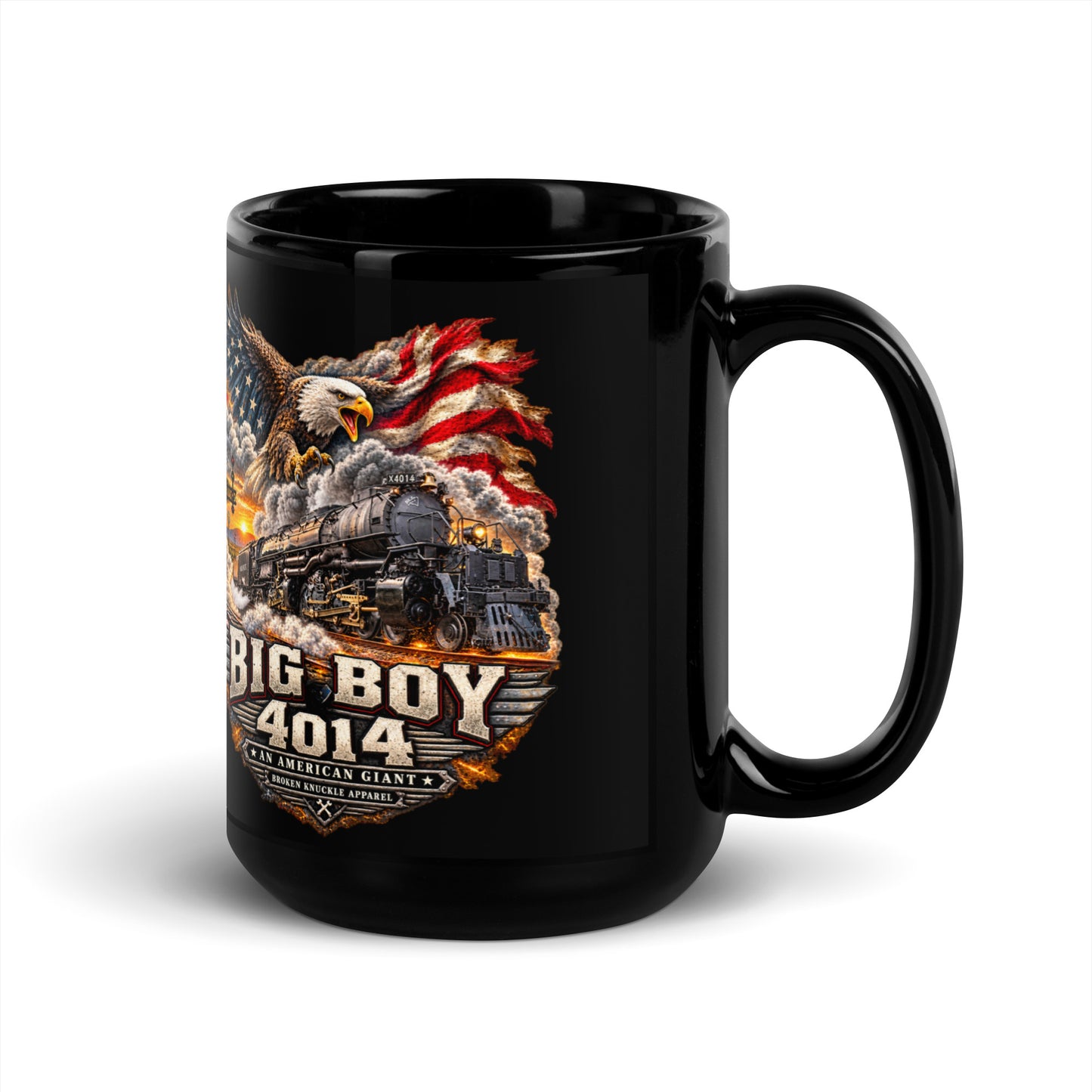 Black glossy 15 oz ceramic mug featuring a highly detailed patriotic graphic. A bald eagle and American flag soar above the Big Boy 4014 steam locomotive charging down the tracks at sunset. Bold metallic-style text reads "BIG BOY 4014" above a banner reading "AN AMERICAN GIANT" and the Broken Knuckle Apparel logo.