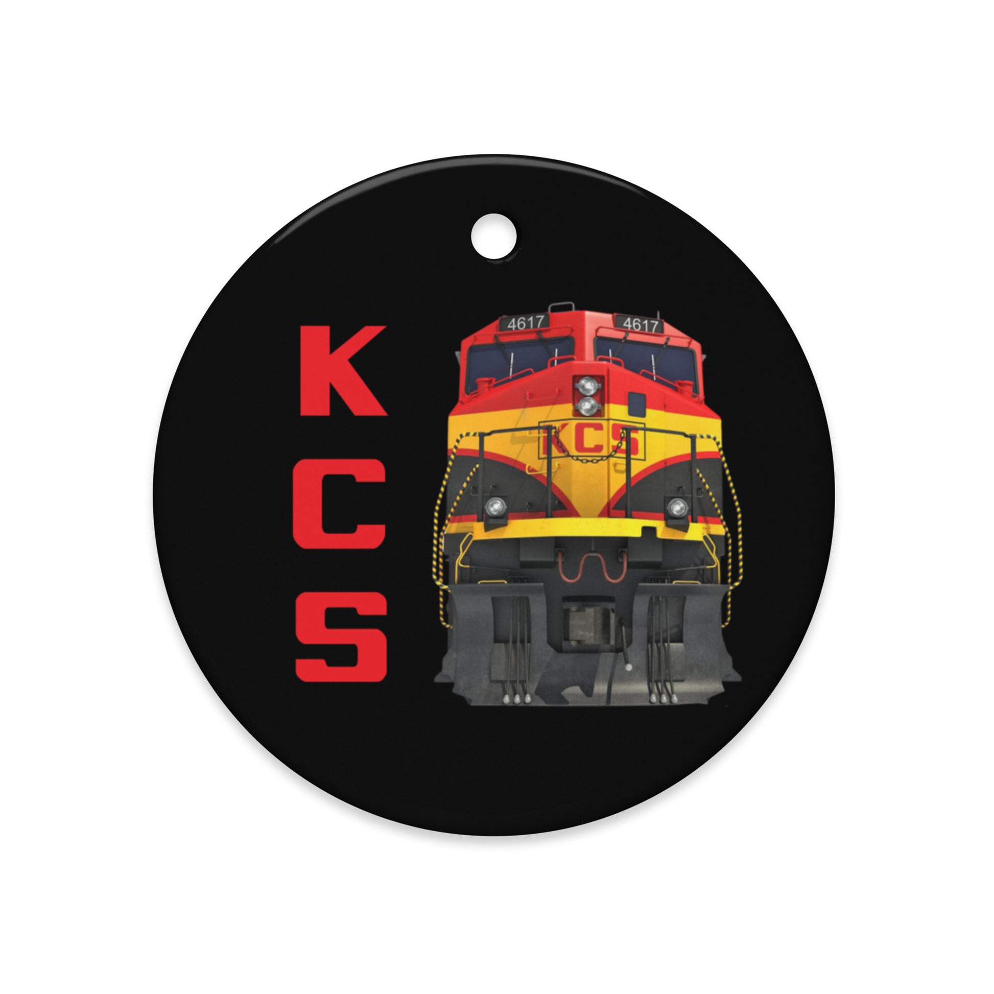 Round black Ceramic Ornament with a train design and 'KCS' text on a white background