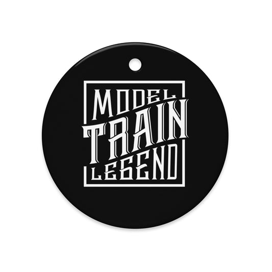 Round black Ceramic Ornament with 'Model Train Legend' text on a white background