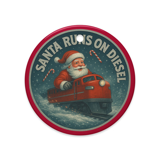 Ceramic Ornament with Santa Claus driving a train and 'Santa Runs on Diesel' text.