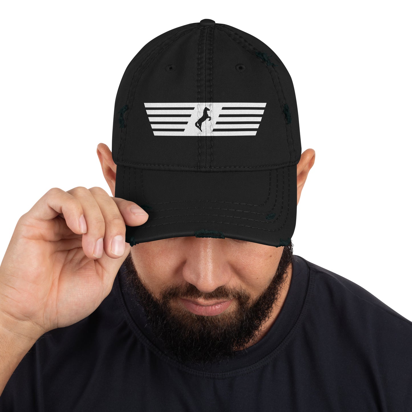 Person wearing a black cap with a white logo on a white background
