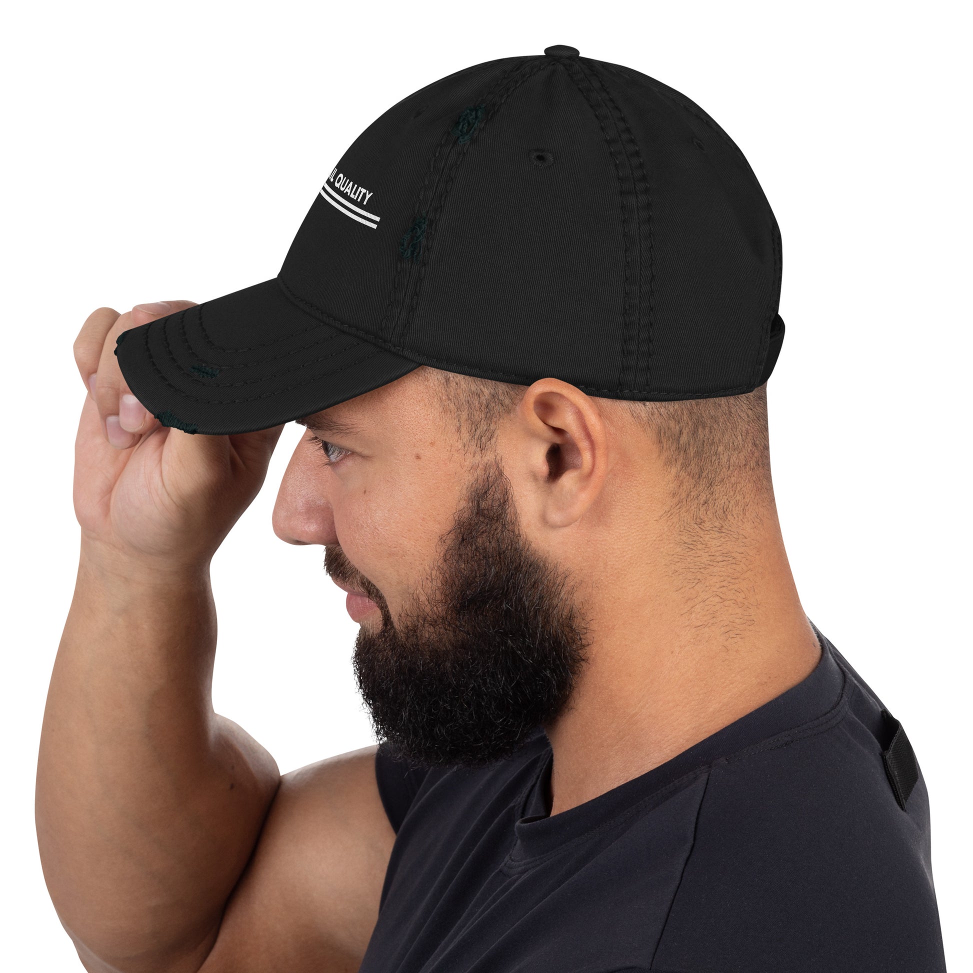 Man wearing a black cap with a visible brand logo on a white background