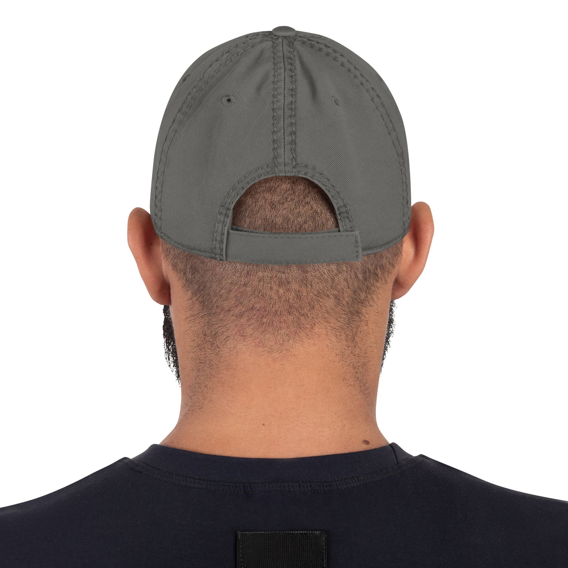Person wearing a gray cap from behind on a white background