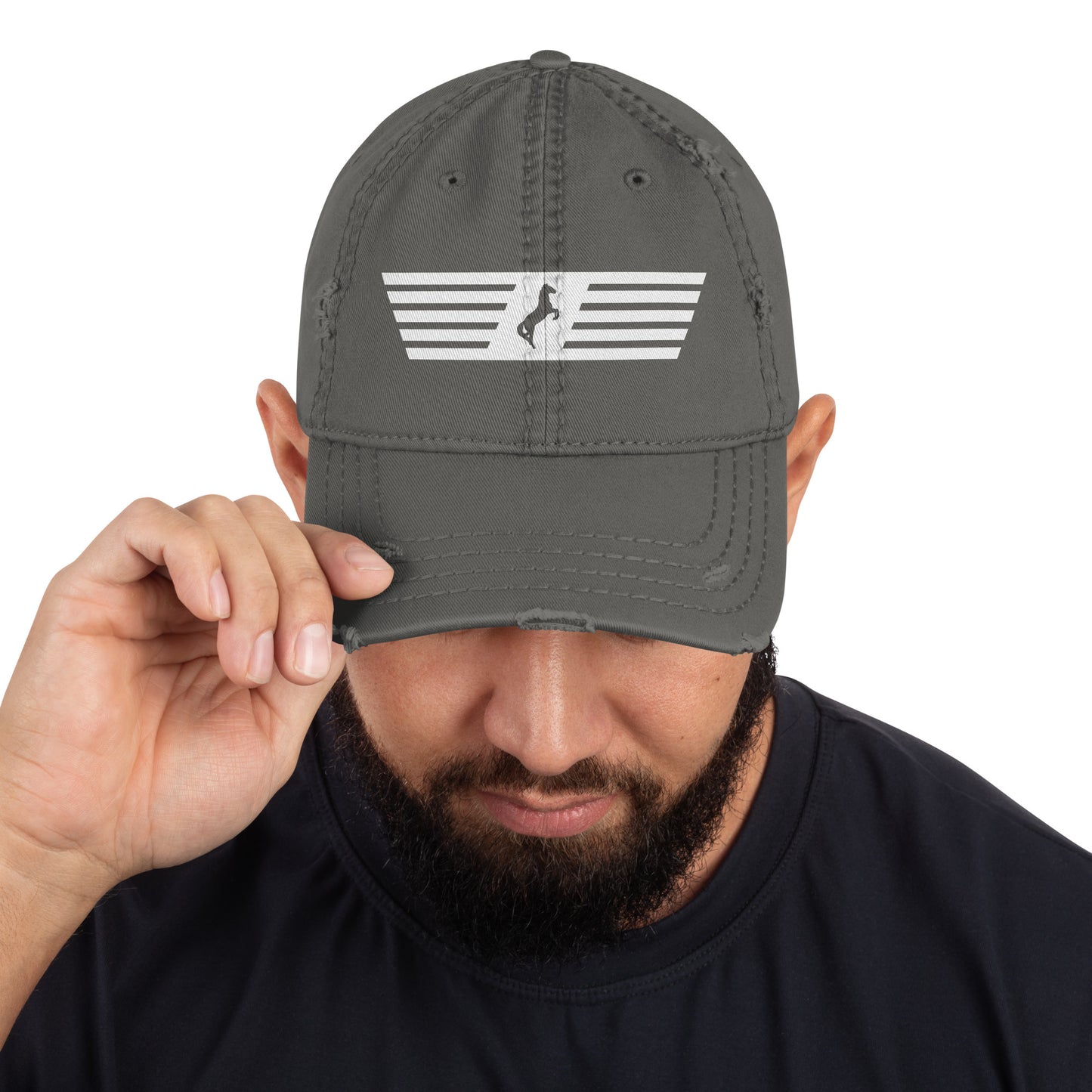 Man wearing a gray cap with a logo on a white background