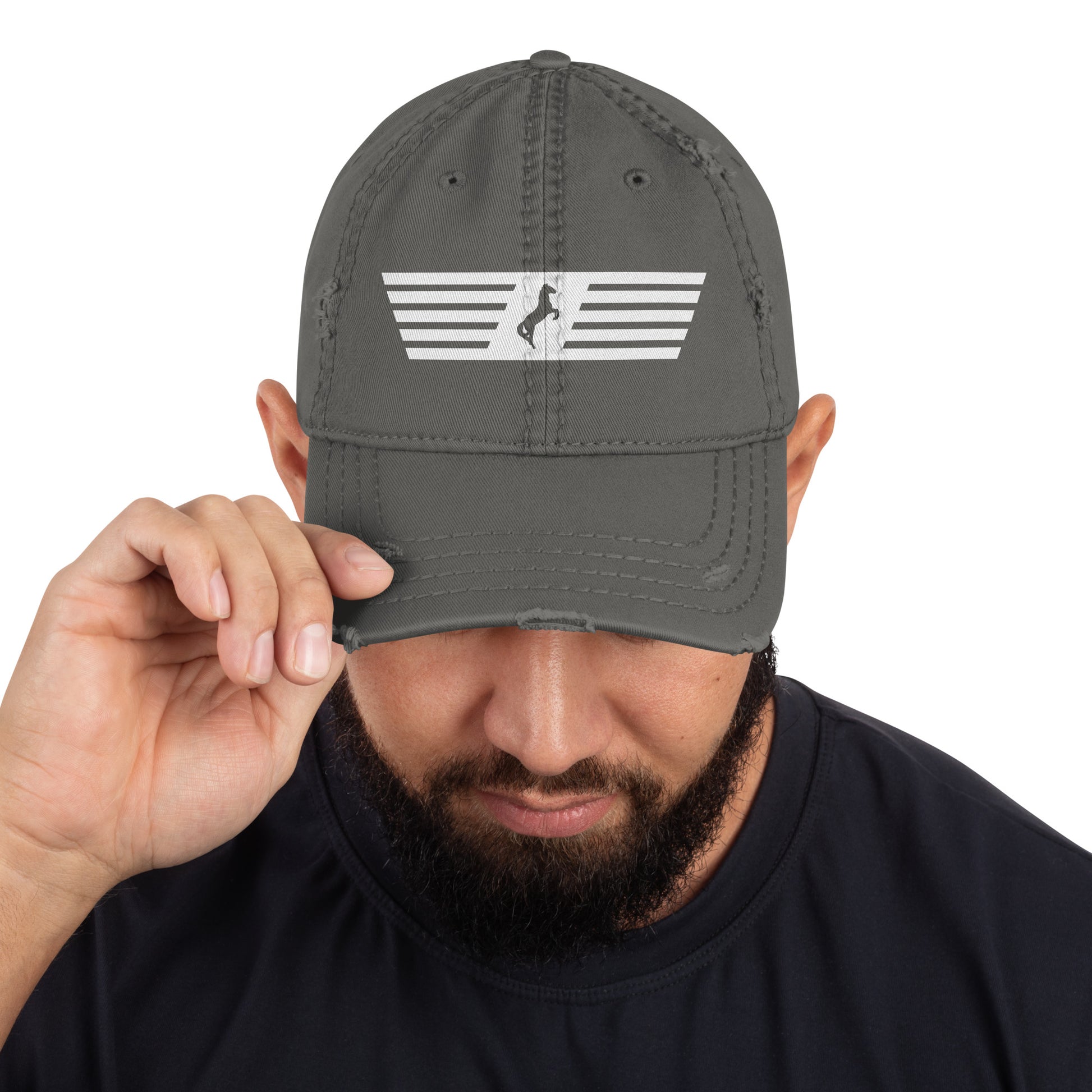 Man wearing a gray cap with a logo on a white background