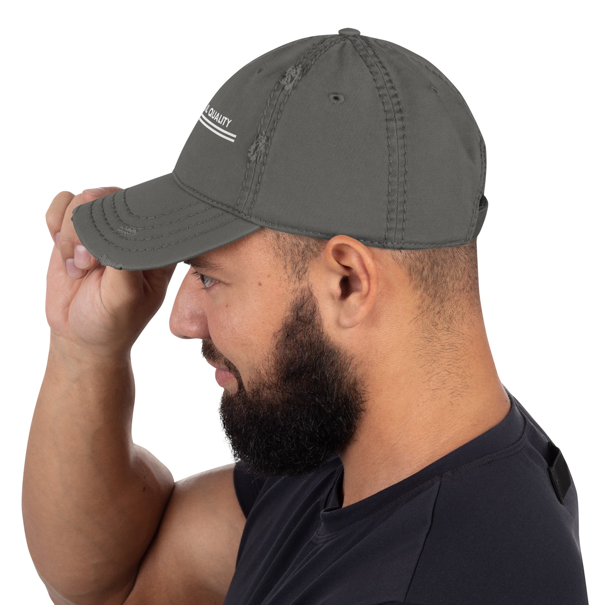Man wearing a gray cap with a visible brand logo on a white background