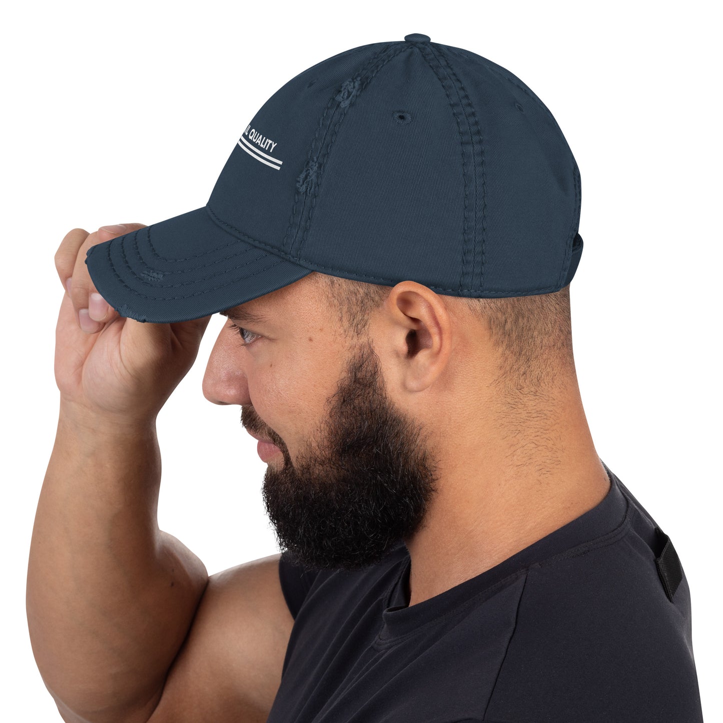 Man wearing a navy blue cap with a brand logo on a white background
