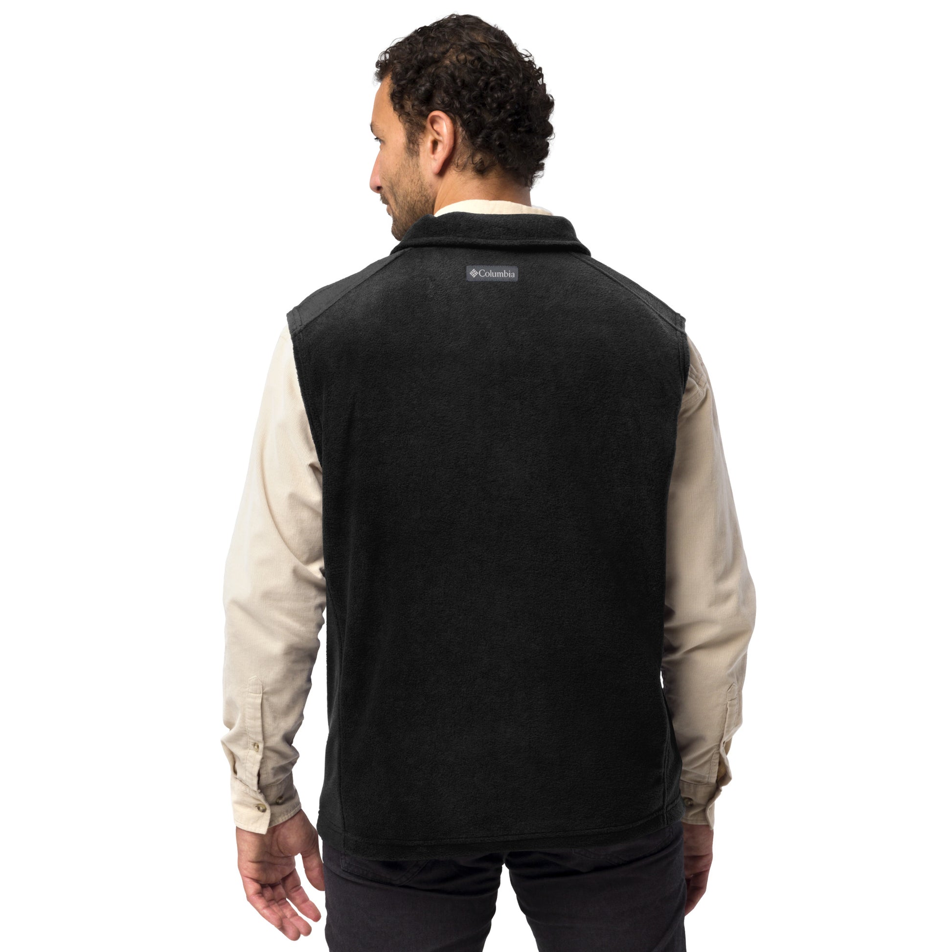 Man wearing a Black Men's Columbia fleece full-zip vest featuring the classic white chalk-style "Big Boy" script logo cleanly embroidered on the right chest.