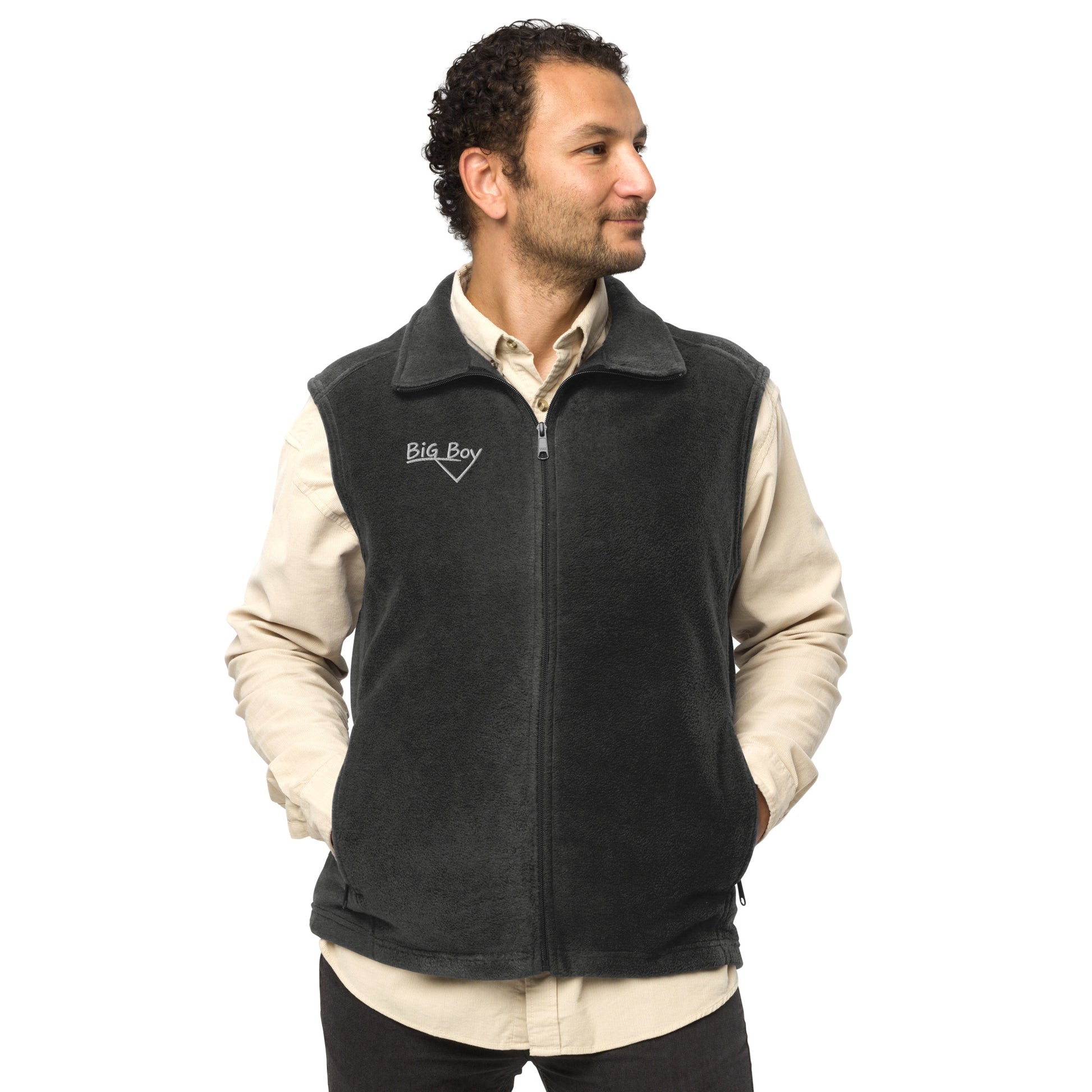 Man wearing a gray Men's Columbia fleece full-zip vest featuring the classic white chalk-style "Big Boy" script logo cleanly embroidered on the right chest.