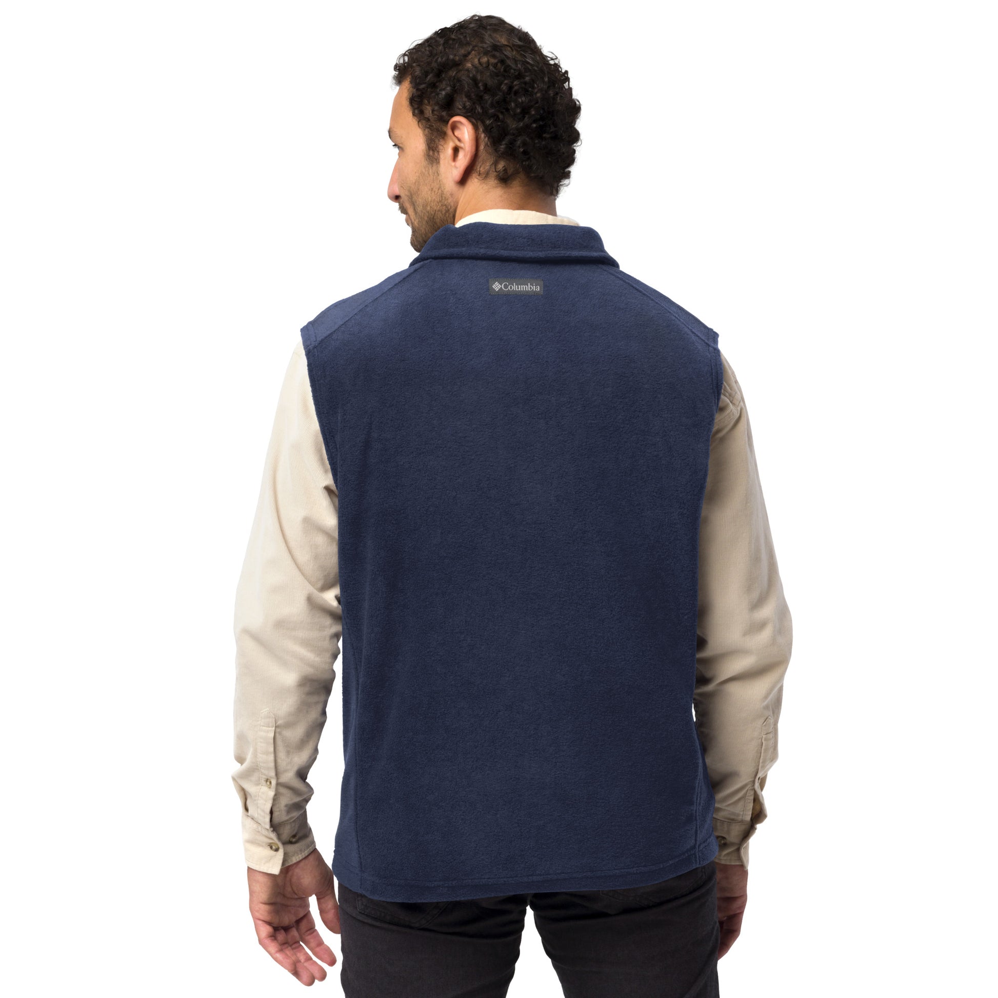 Man wearing a navy Men's Columbia fleece full-zip vest featuring the classic white chalk-style "Big Boy" script logo cleanly embroidered on the right chest.