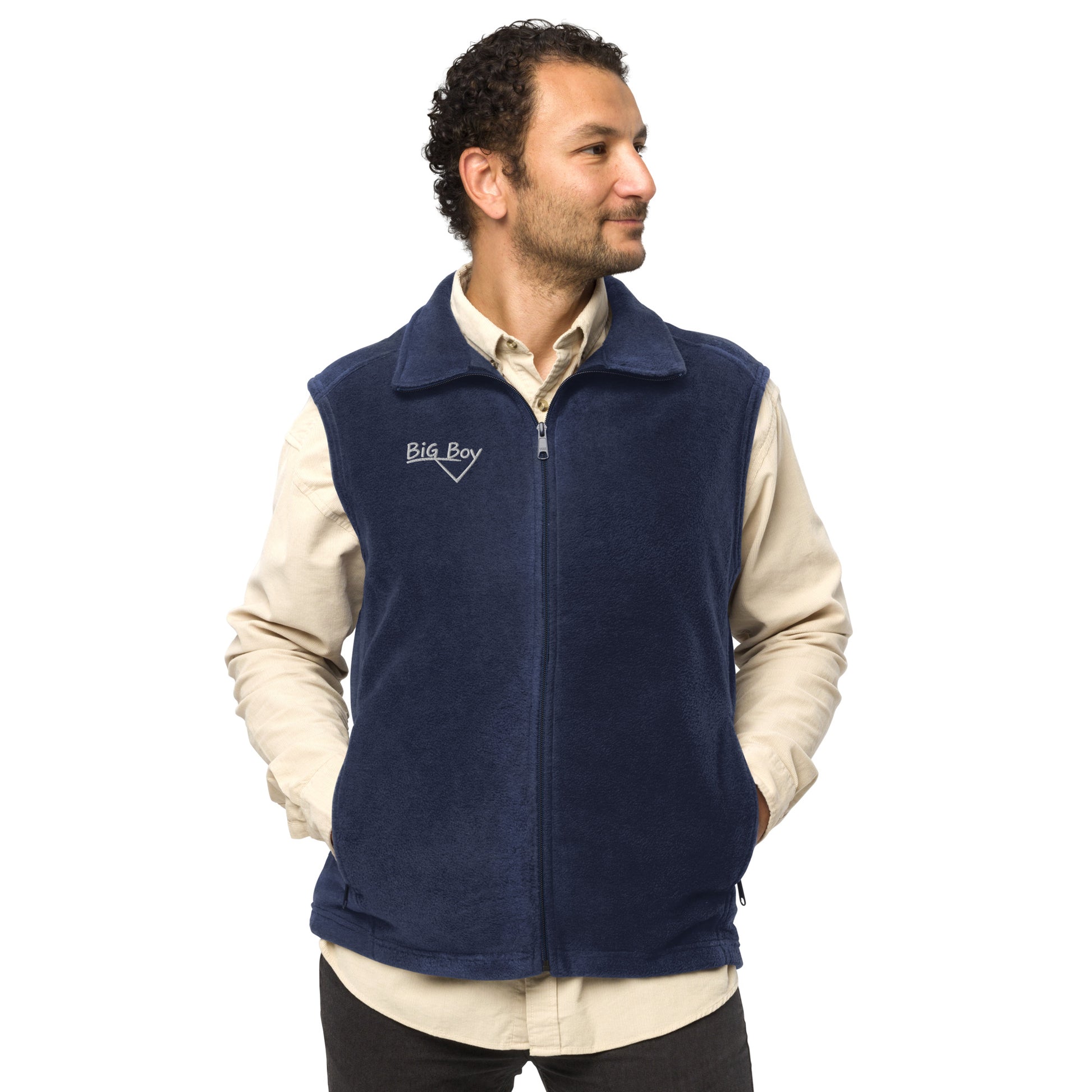 Man wearing a navy Men's Columbia fleece full-zip vest featuring the classic white chalk-style "Big Boy" script logo cleanly embroidered on the right chest.