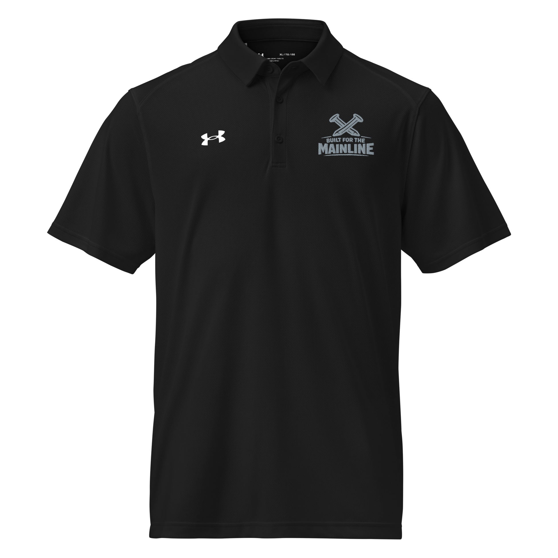 Black Under Armour men's polo shirt featuring a graphic of crossed railroad spikes above the text "BUILT FOR THE MAINLINE" on the left chest. A white Under Armour logo is displayed on the right chest. The shirt has a classic collar and a multi-button placket.