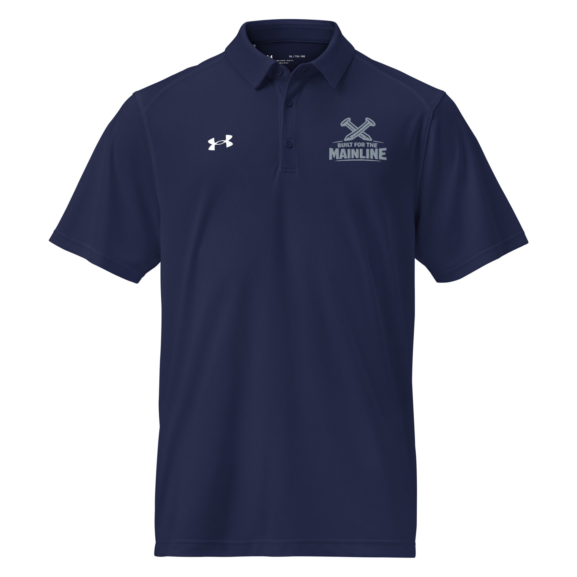 Navy Under Armour men's polo shirt featuring a graphic of crossed railroad spikes above the text "BUILT FOR THE MAINLINE" on the left chest. A white Under Armour logo is displayed on the right chest. The shirt has a classic collar and a multi-button placket.