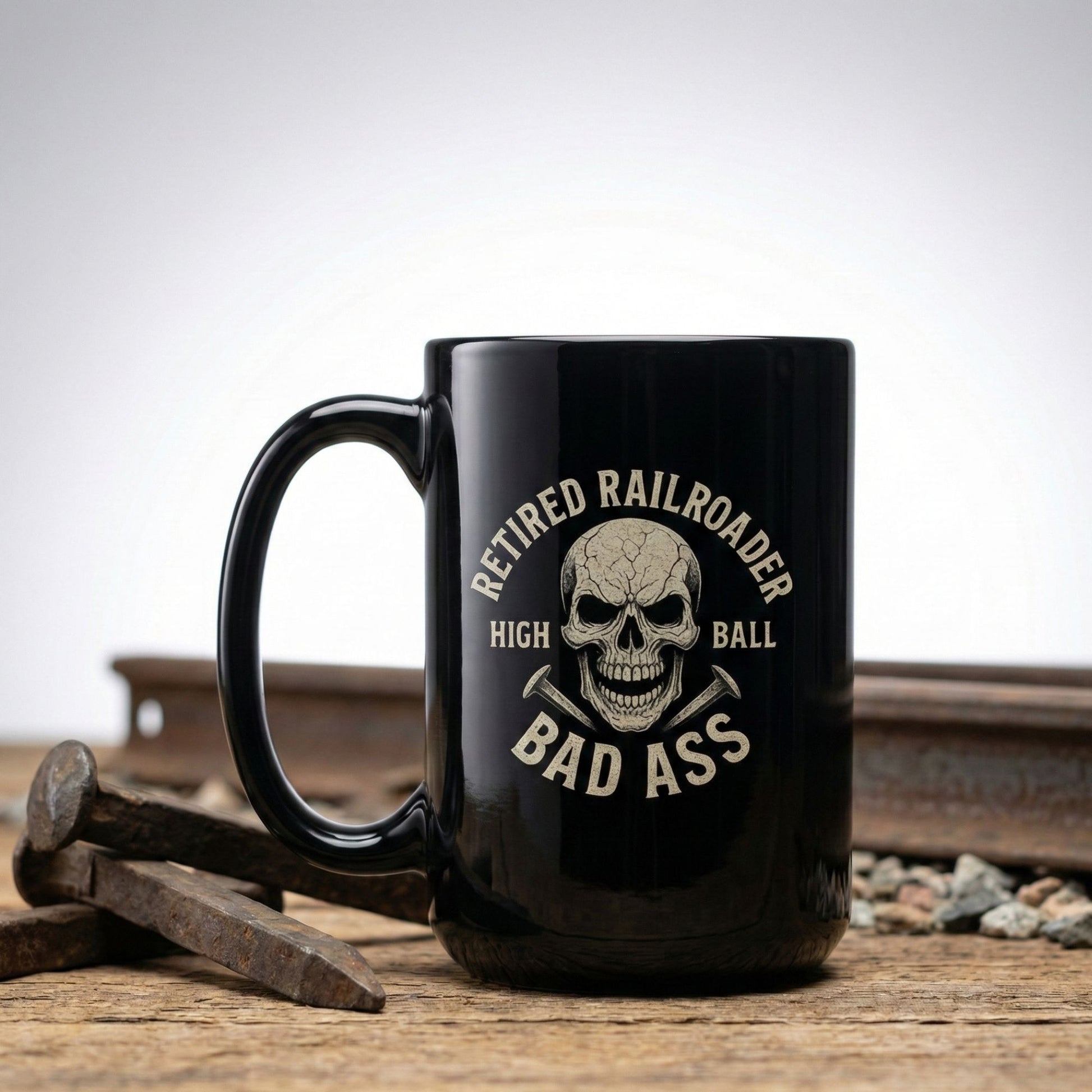 Black mug with skull design and text on a wooden surface