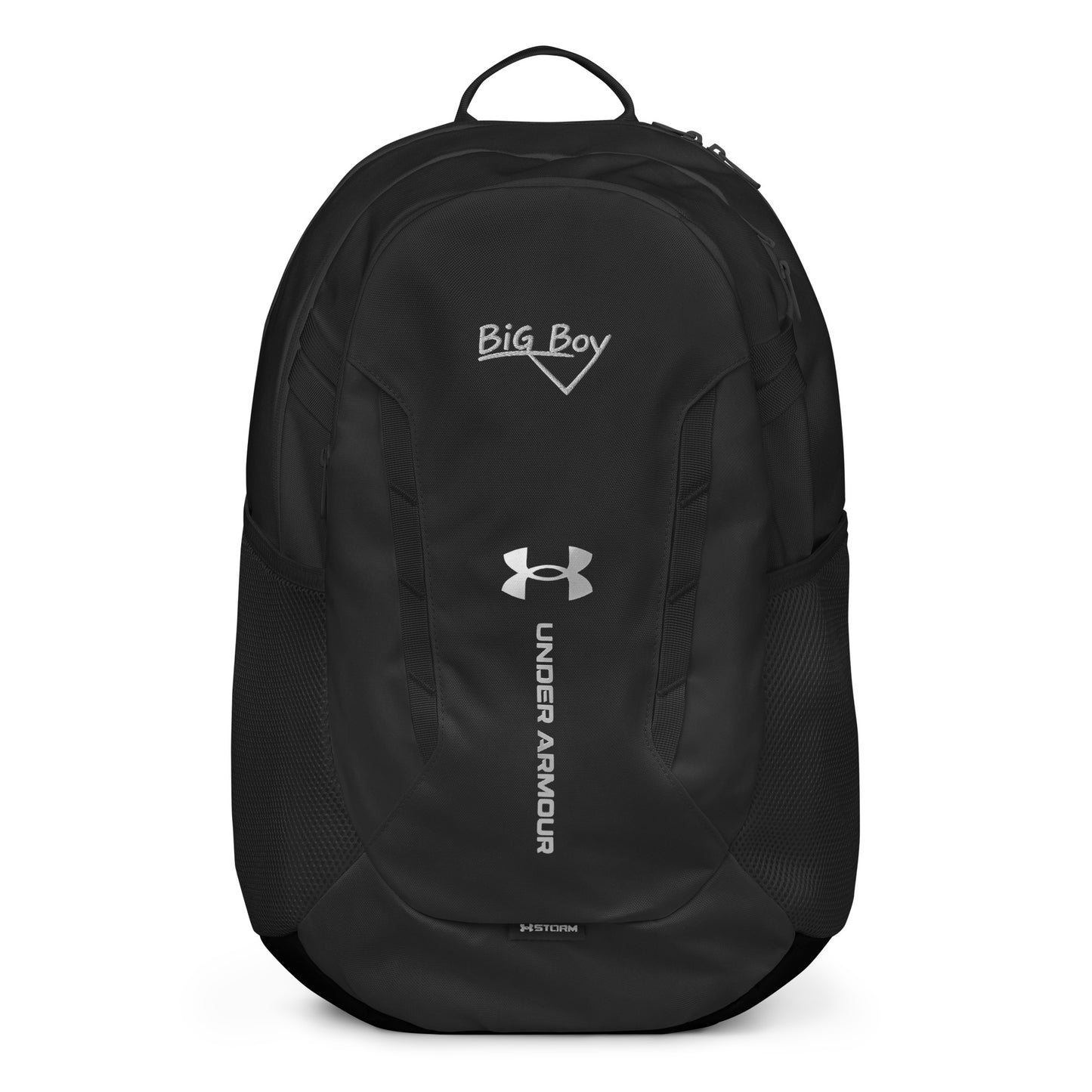 Black Under Armour backpack featuring the classic white chalk-style "Big Boy" script logo on the top front panel. A silver Under Armour logo is centered above the vertical text "UNDER ARMOUR". The bottom of the bag features the UA Storm technology badge.