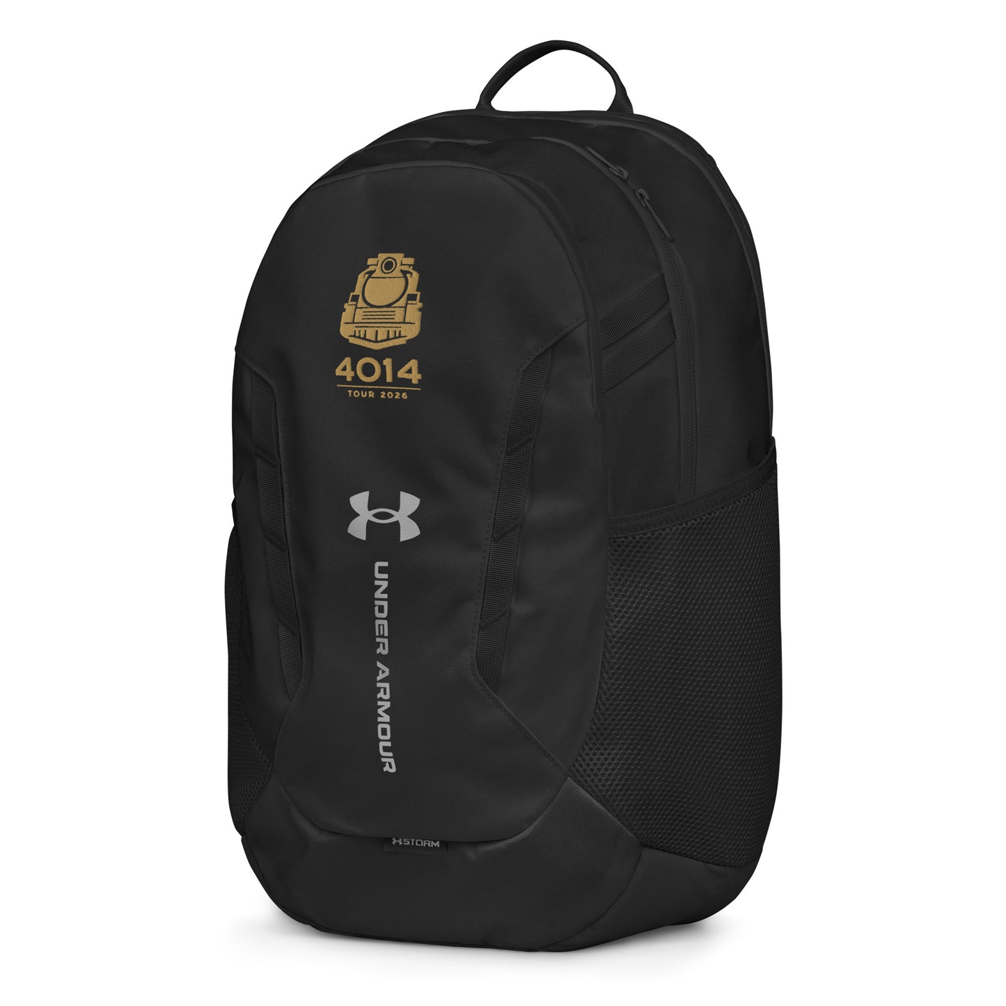 Black Under Armour backpack featuring a gold graphic of a front-facing steam locomotive above the text "4014 TOUR 2026". The silver Under Armour logo is centered on the front above the vertical text "UNDER ARMOUR". The bottom of the bag features the UA Storm technology badge.