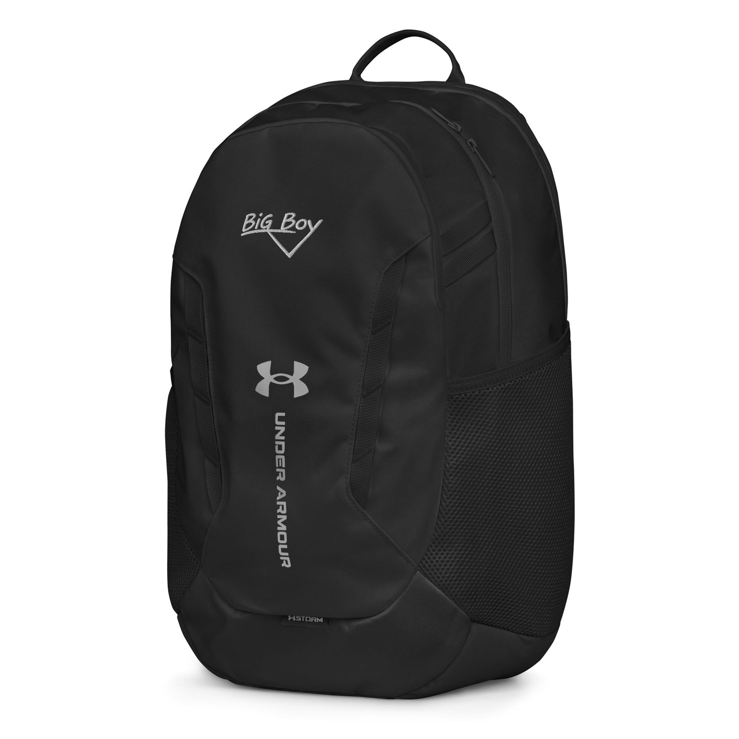 Black Under Armour backpack featuring the classic white chalk-style "Big Boy" script logo on the top front panel. A silver Under Armour logo is centered above the vertical text "UNDER ARMOUR". The bottom of the bag features the UA Storm technology badge.