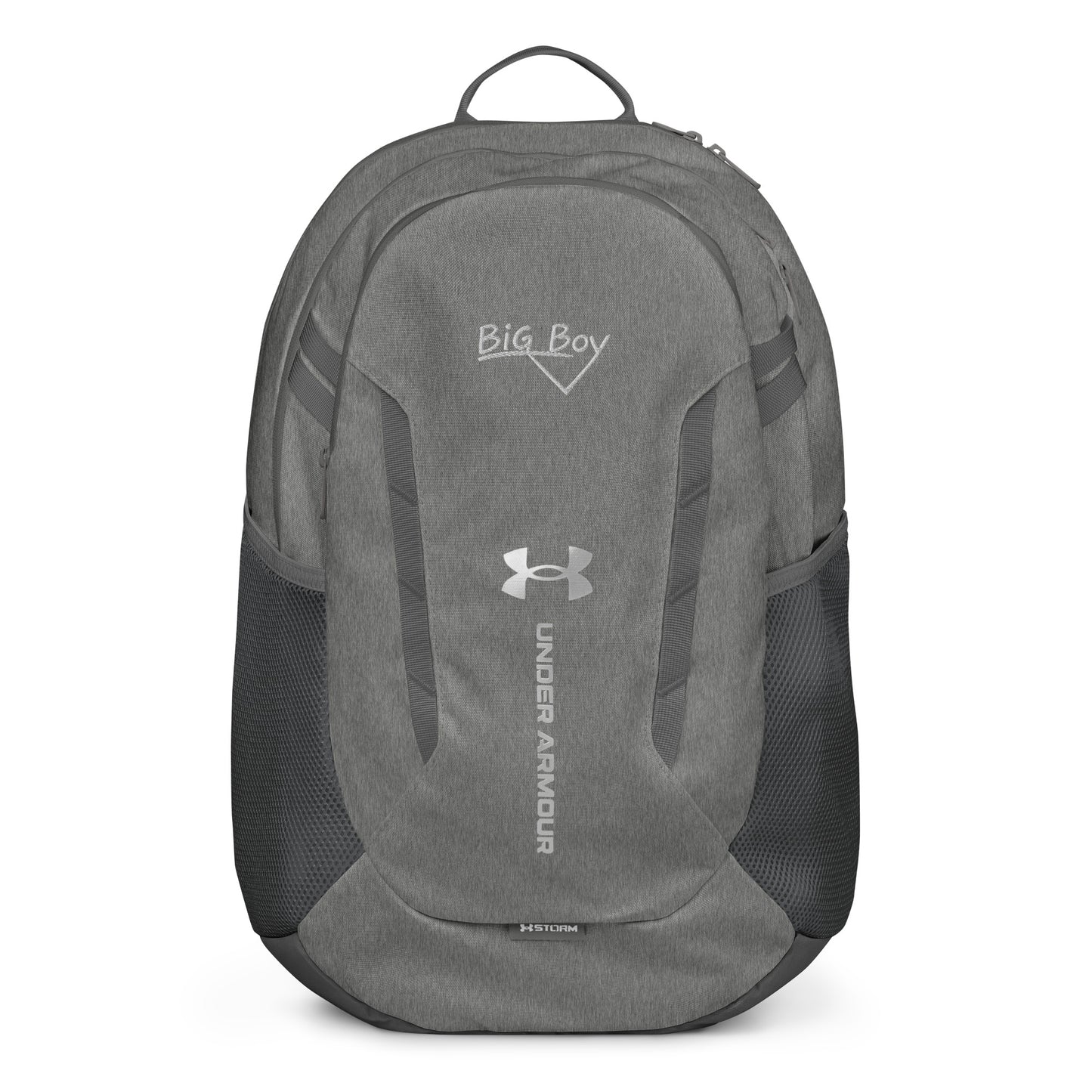 Gray Under Armour backpack featuring the classic white chalk-style "Big Boy" script logo on the top front panel. A silver Under Armour logo is centered above the vertical text "UNDER ARMOUR". The bottom of the bag features the UA Storm technology badge.