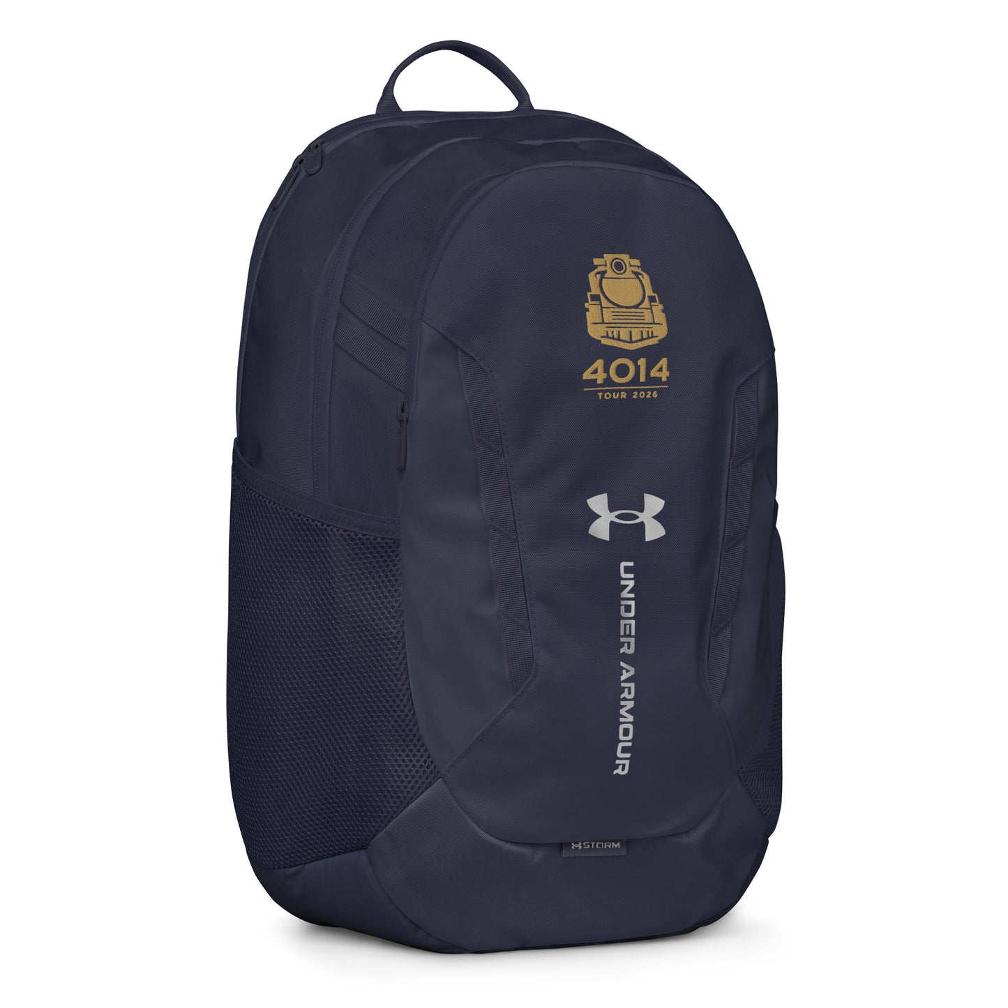 Navy Under Armour backpack featuring a gold graphic of a front-facing steam locomotive above the text "4014 TOUR 2026". The silver Under Armour logo is centered on the front above the vertical text "UNDER ARMOUR". The bottom of the bag features the UA Storm technology badge.