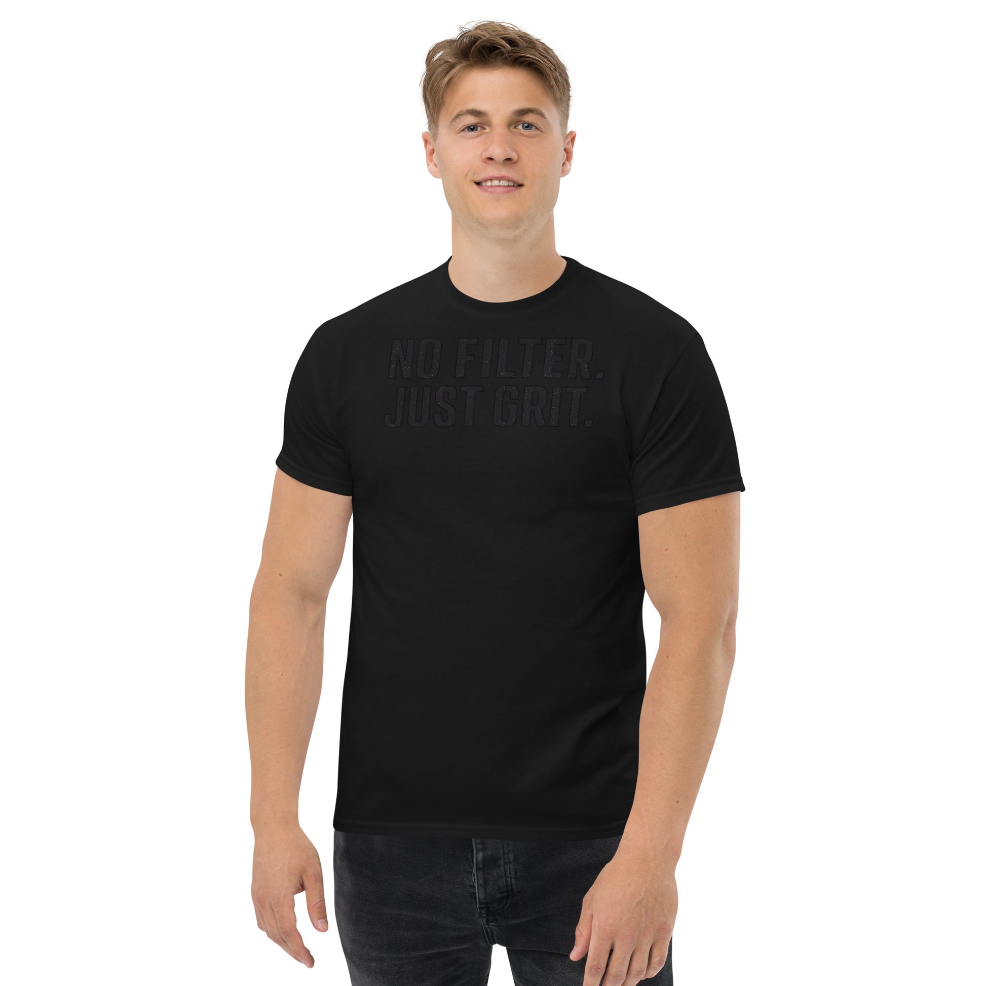 Man wearing a black t-shirt with 'No Filter Just Grit' text on a white background