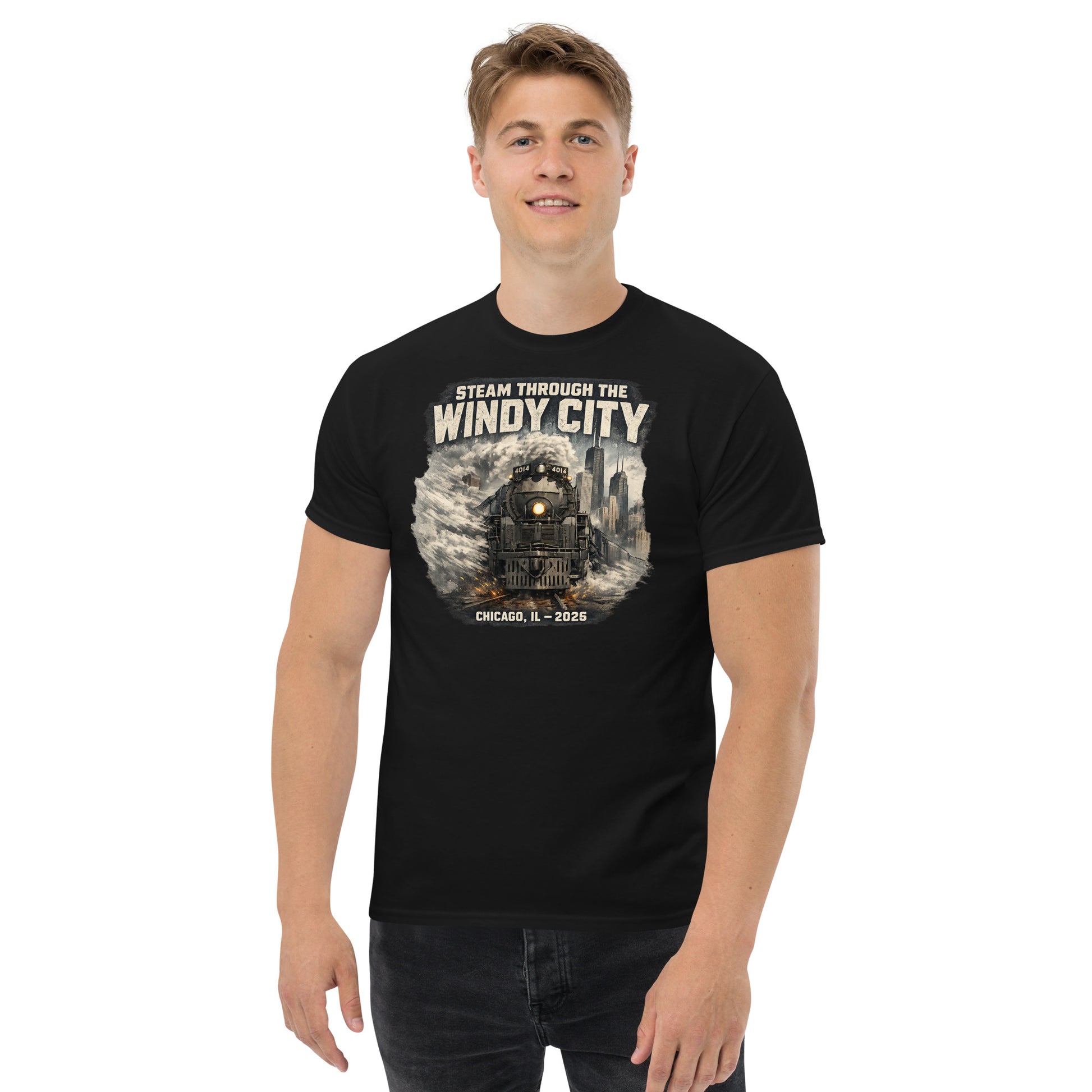 Black t-shirt featuring a graphic of a steam locomotive emerging from smoke in front of a city skyline, with text reading "STEAM THROUGH THE WINDY CITY" at the top and "CHICAGO, IL - 2026" at the bottom.