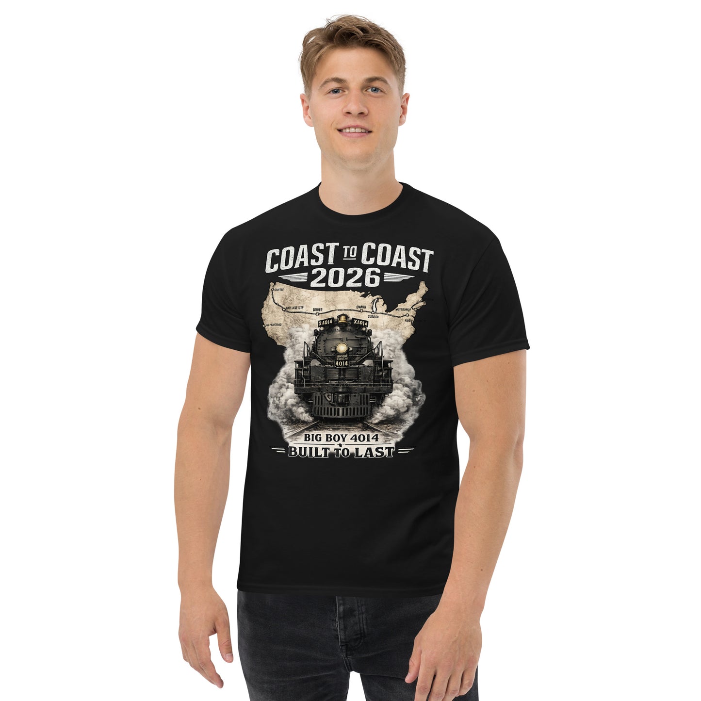 Black t-shirt featuring a head-on graphic of the Big Boy 4014 steam locomotive emerging from a vintage US map showing a cross-country route, with text reading "Coast to Coast 2026" and "Built To Last".