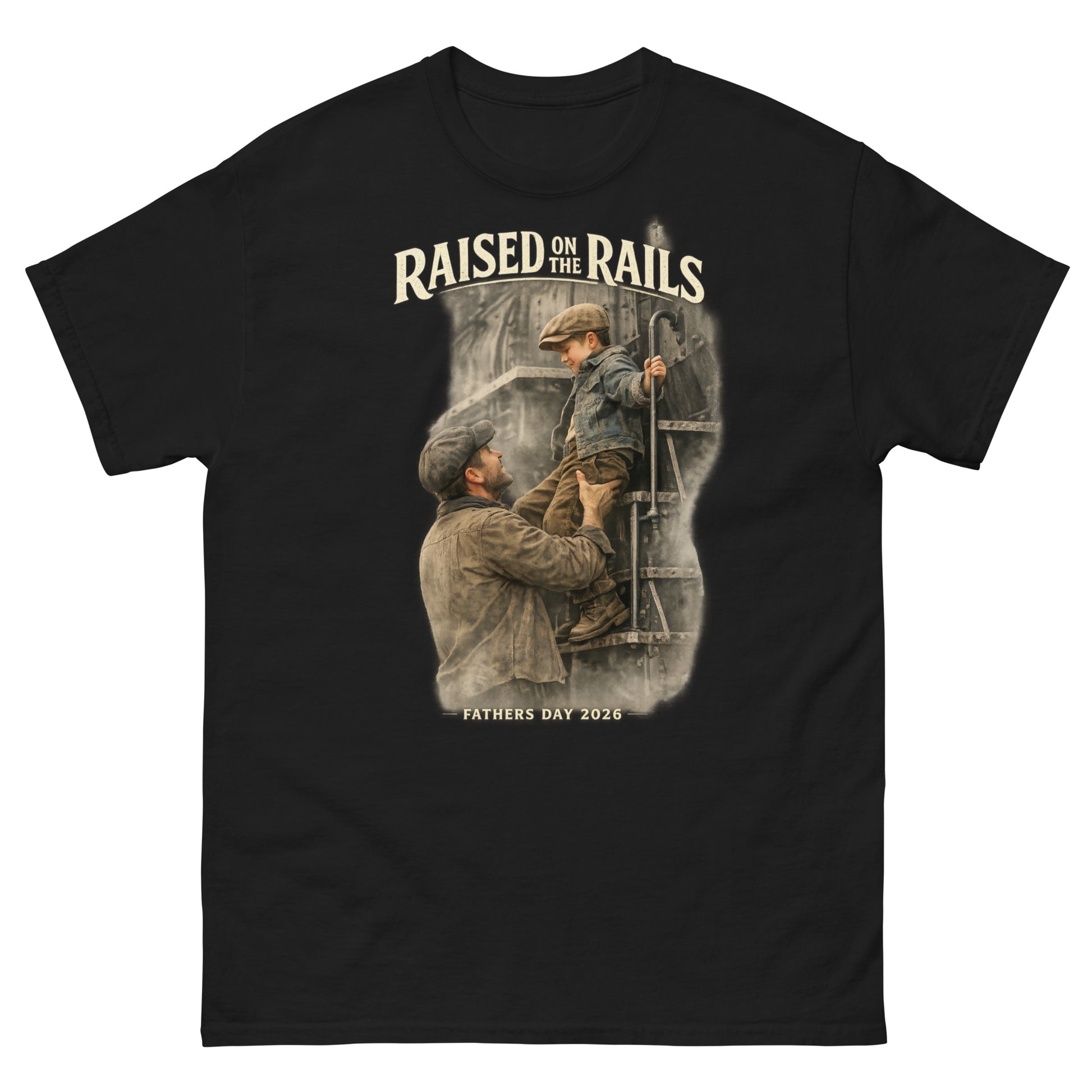 Black t-shirt featuring a vintage-style graphic of a father lifting his young son onto a steam locomotive ladder, with text reading "Raised On The Rails" and "Fathers Day 2026".
