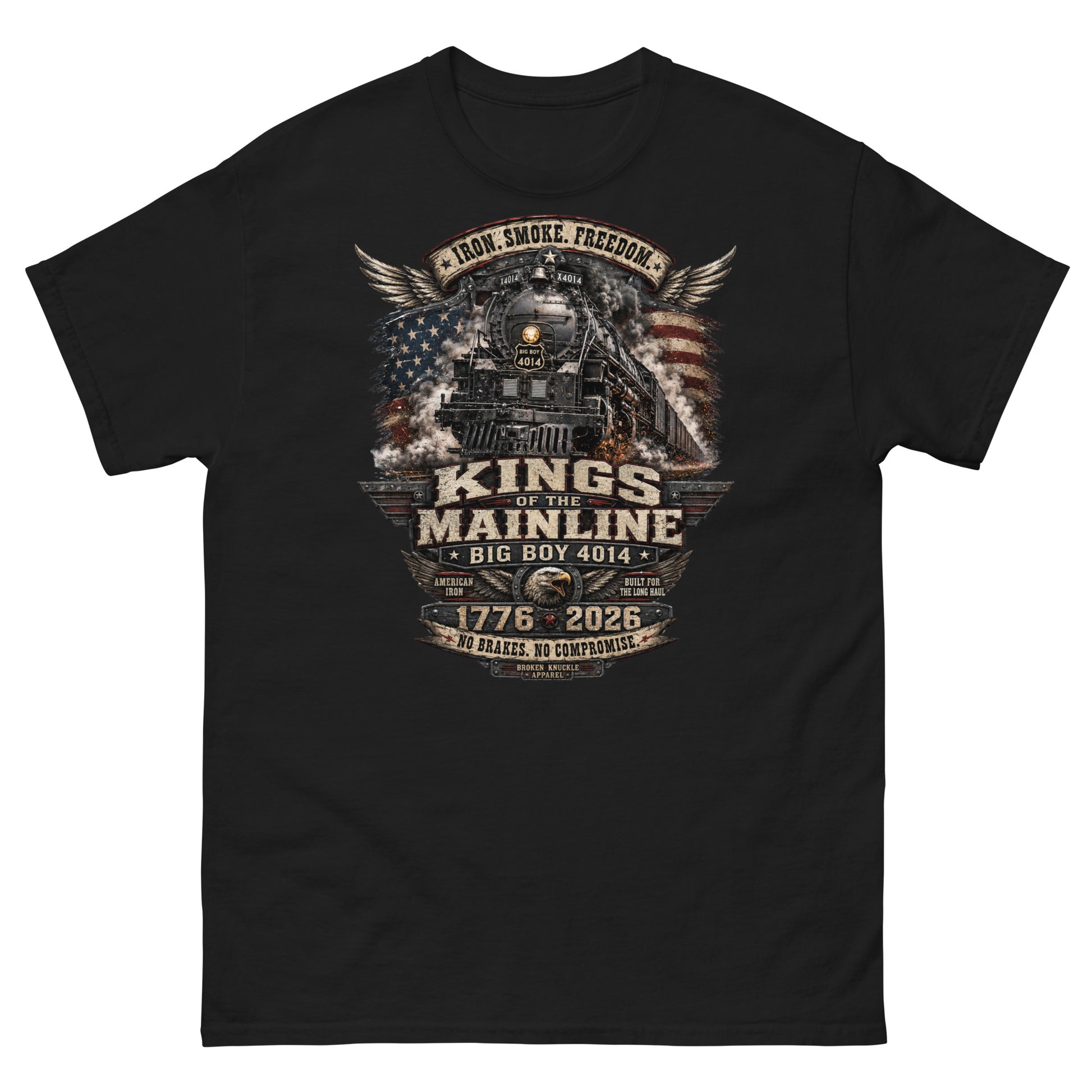 Black t-shirt featuring a highly detailed patriotic graphic. The Big Boy 4014 steam locomotive is centered against a distressed American flag and wings. A banner at the top reads "IRON. SMOKE. FREEDOM." Large text reads "KINGS OF THE MAINLINE" and "BIG BOY 4014". Below is a bald eagle head between badges reading "AMERICAN IRON" and "BUILT FOR THE LONG HAUL". The bottom features "1776 - 2026", "NO BRAKES. NO COMPROMISE.", and "BROKEN KNUCKLE APPAREL".