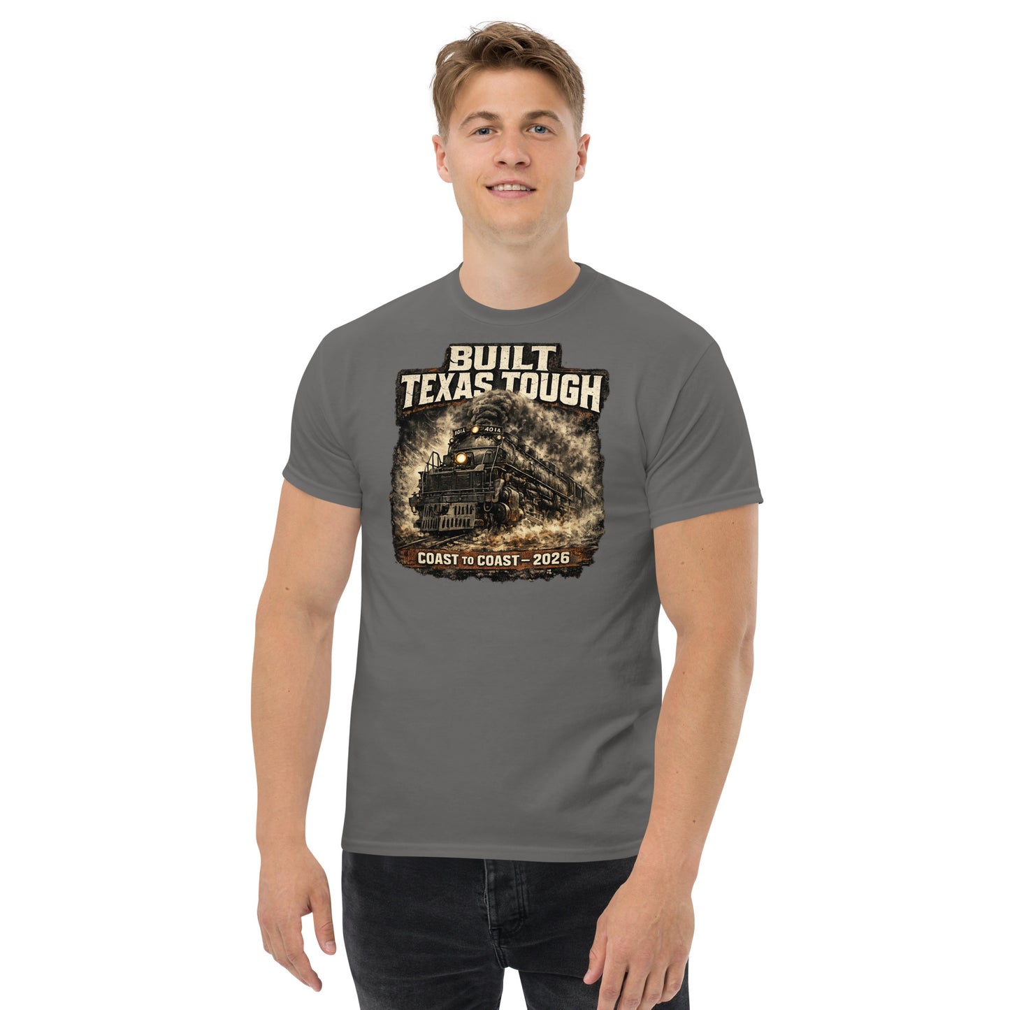 Gray t-shirt featuring a gritty, cinematic graphic of the Big Boy 4014 steam locomotive emerging from thick smoke with text reading "Built Texas Tough" and "Coast to Coast - 2026".
