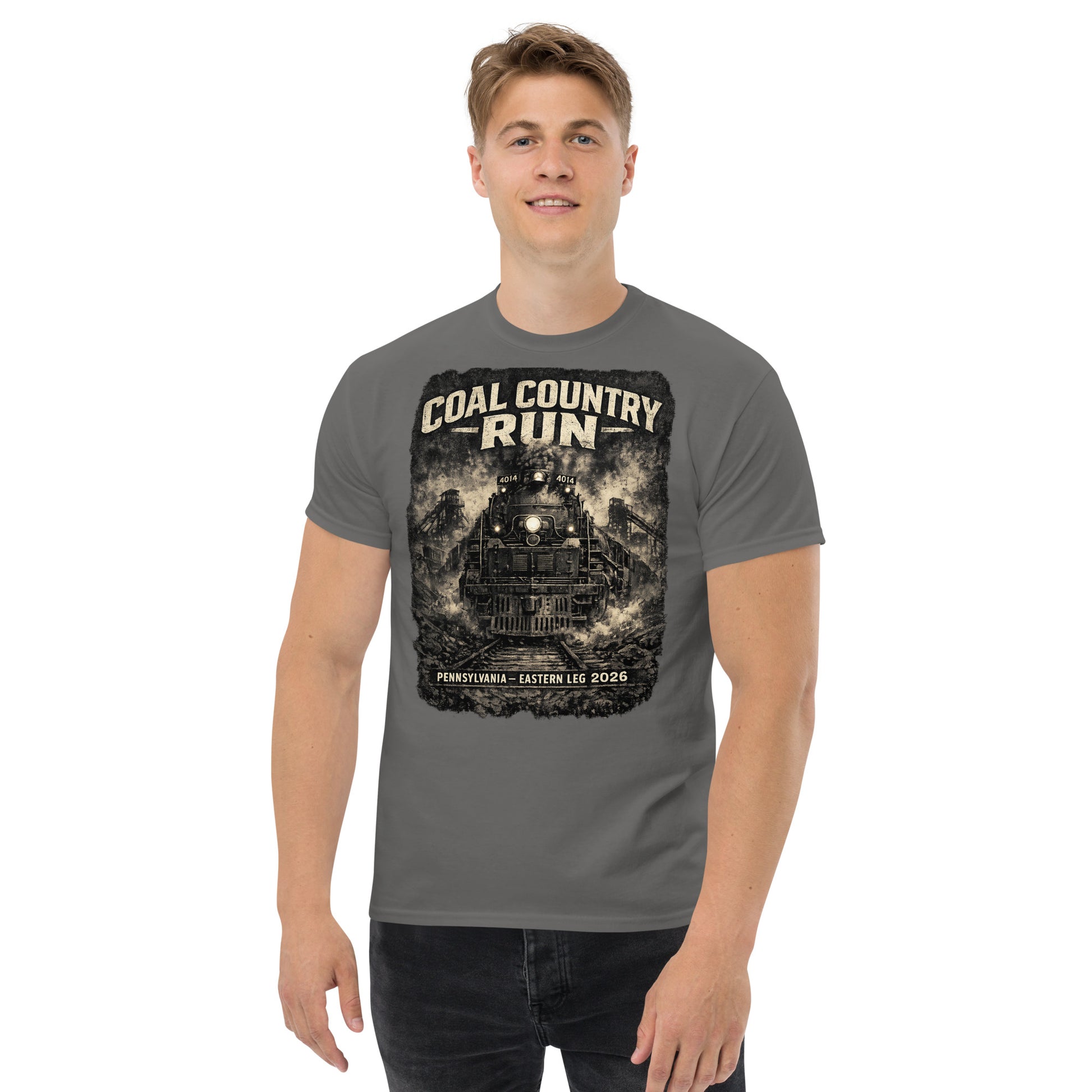 Gray t-shirt featuring a dark, gritty graphic of the Big Boy 4014 steam locomotive passing historic coal mine structures, with text reading "Coal Country Run" and "Pennsylvania - Eastern Leg 2026".
