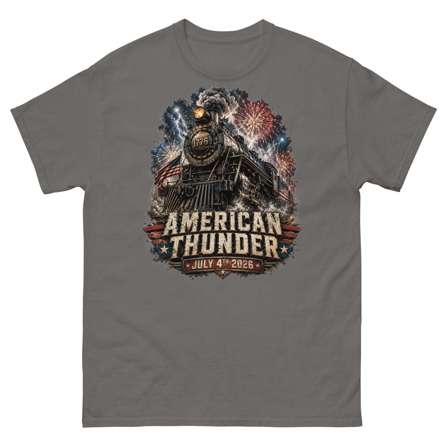 Gray t-shirt featuring a 1776 steam locomotive charging through smoke and patriotic fireworks, with an American flag and distressed text reading "AMERICAN THUNDER" over a red, white, and blue banner, followed by "JULY 4TH 2026".