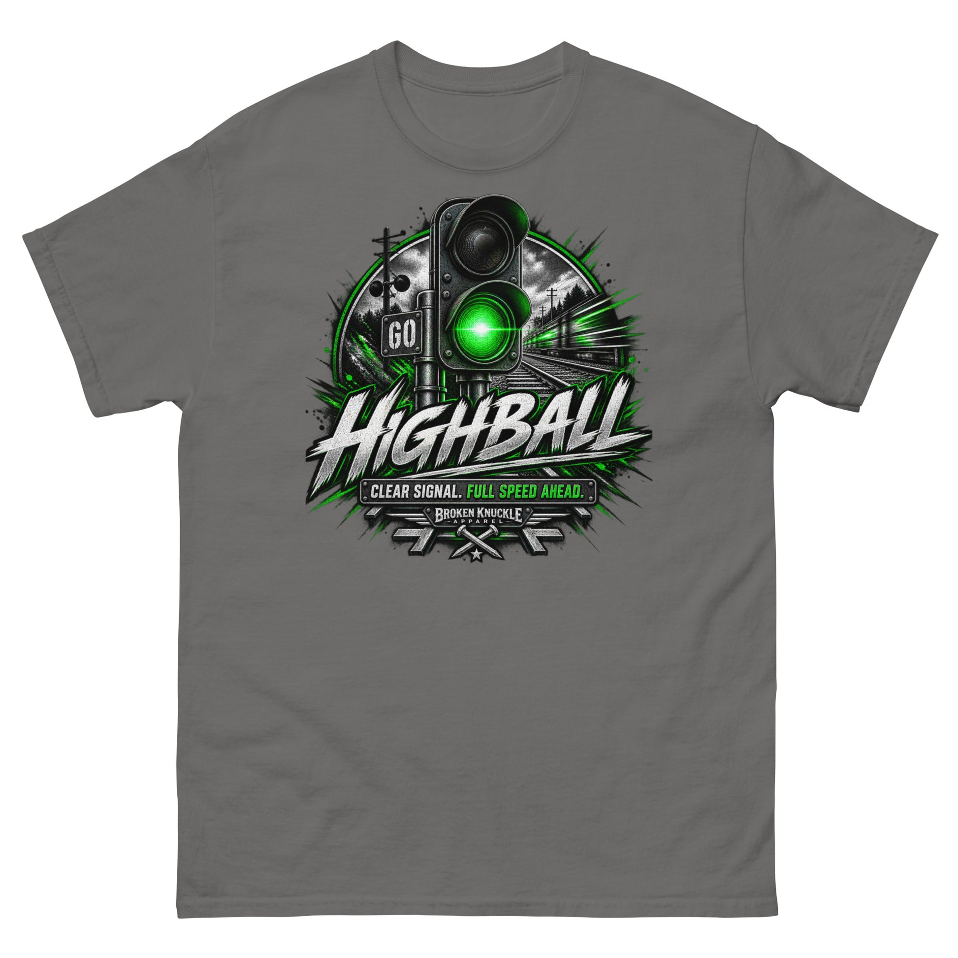 Charcoal classic t-shirt featuring a high-contrast graphic of a trackside railroad signal shining a bright green light. A train blurs past in the background to convey high speed. Bold, distressed silver text reads "HIGHBALL" above a banner reading "CLEAR SIGNAL. FULL SPEED AHEAD." and the Broken Knuckle Apparel logo with crossed railroad spikes.