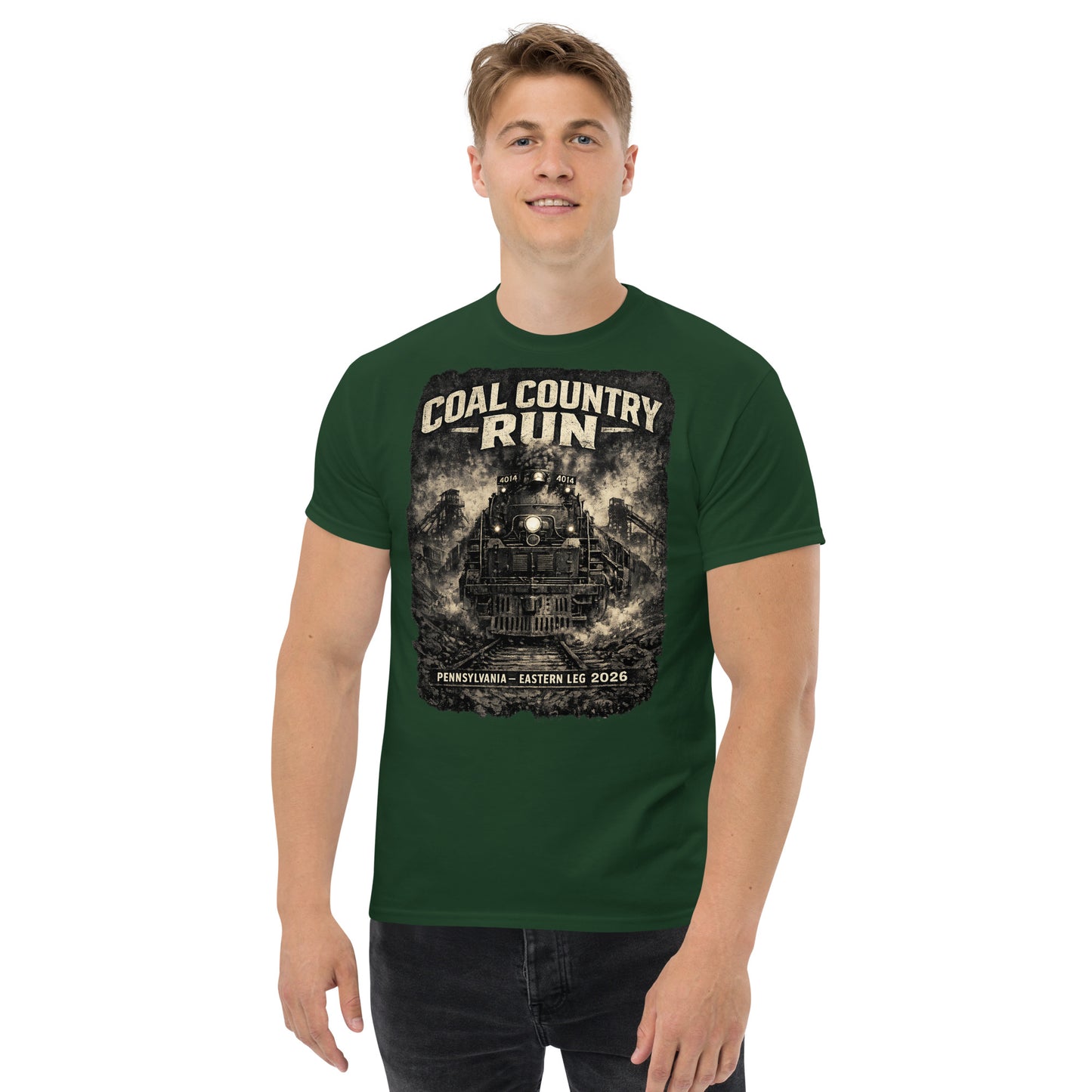 Forest green t-shirt featuring a dark, gritty graphic of the Big Boy 4014 steam locomotive passing historic coal mine structures, with text reading "Coal Country Run" and "Pennsylvania - Eastern Leg 2026".