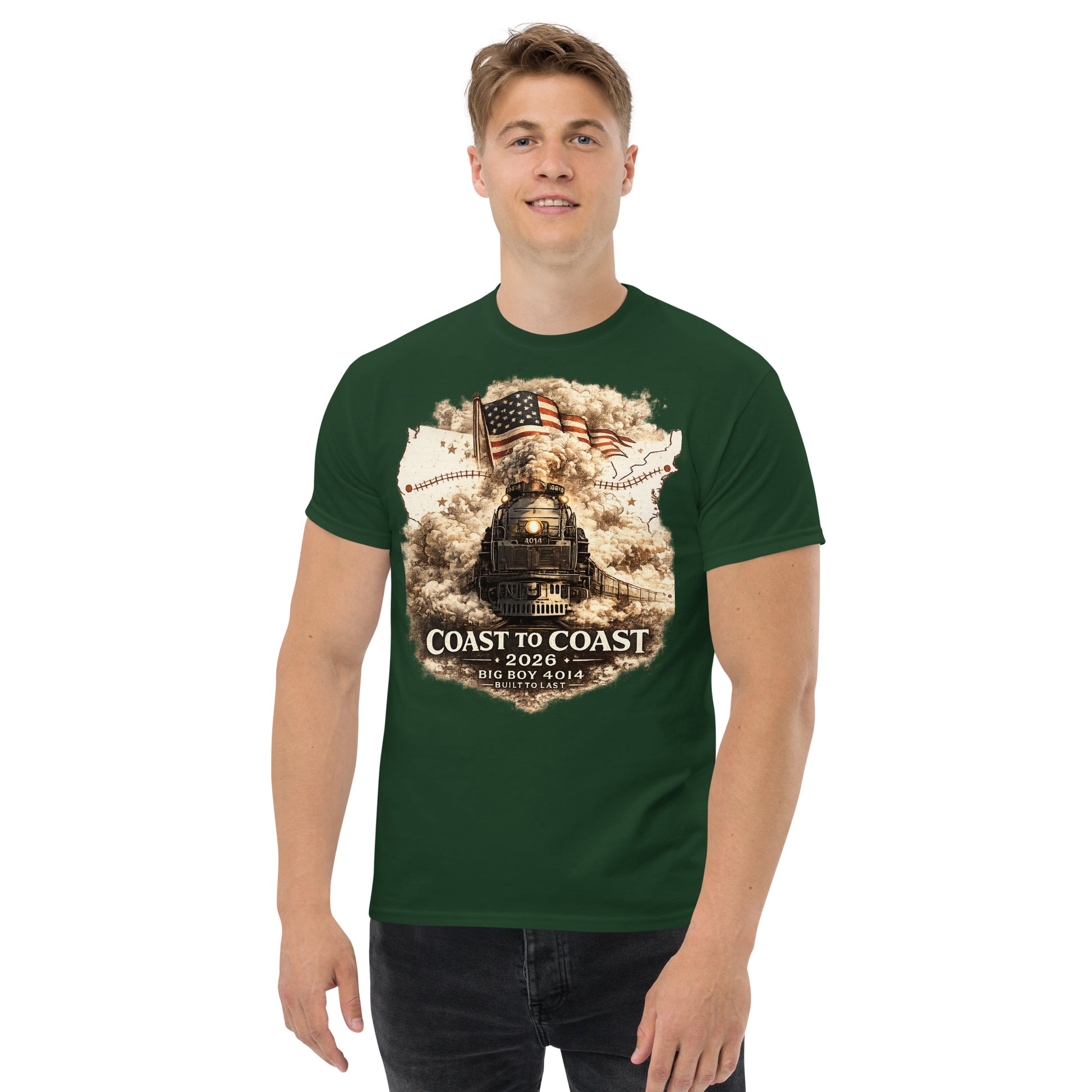 Forest green t-shirt featuring the Big Boy 4014 steam locomotive, a waving American flag, and a US map showing a track route, with text reading "Coast to Coast 2026", "Big Boy 4014", and "Built To Last".